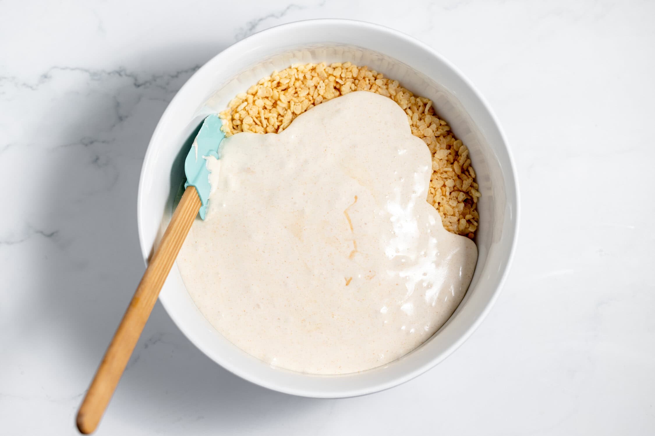 browned butter marshmallow mixture poured over rice krispies