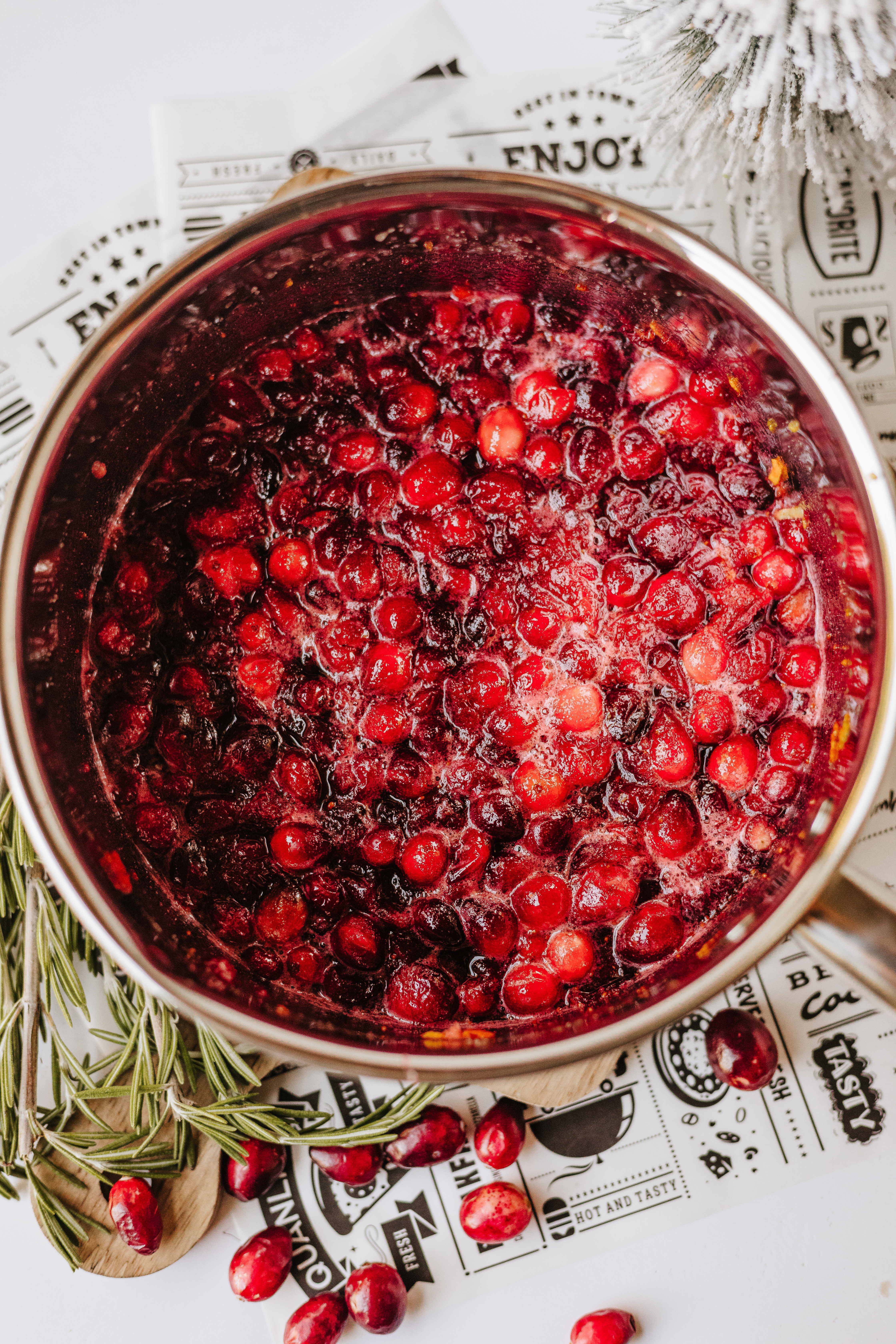 cooking cranberry jam in a large pot