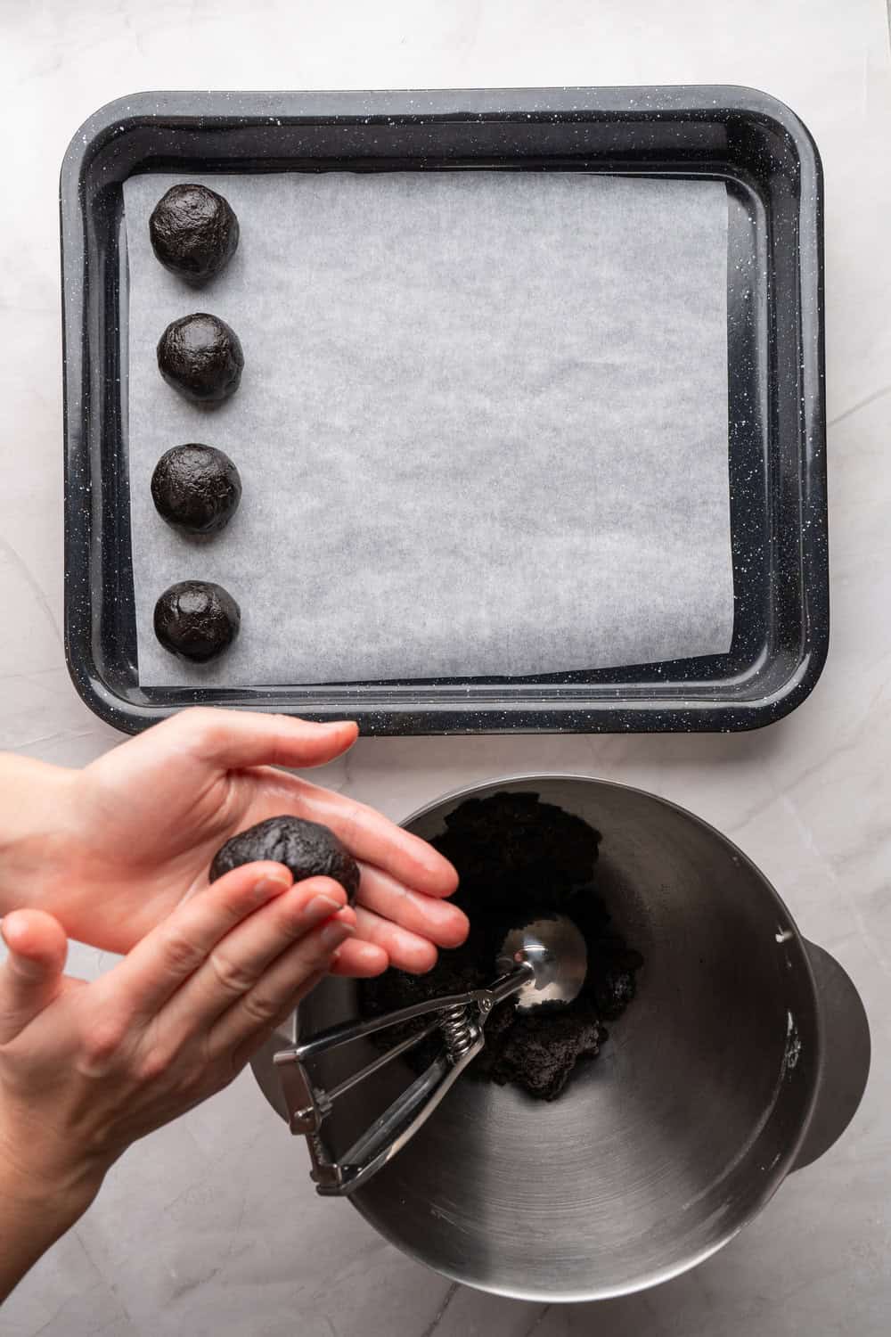 rolling oreo balls in hand