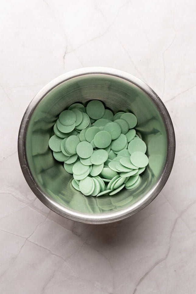 green candy melts in bowl
