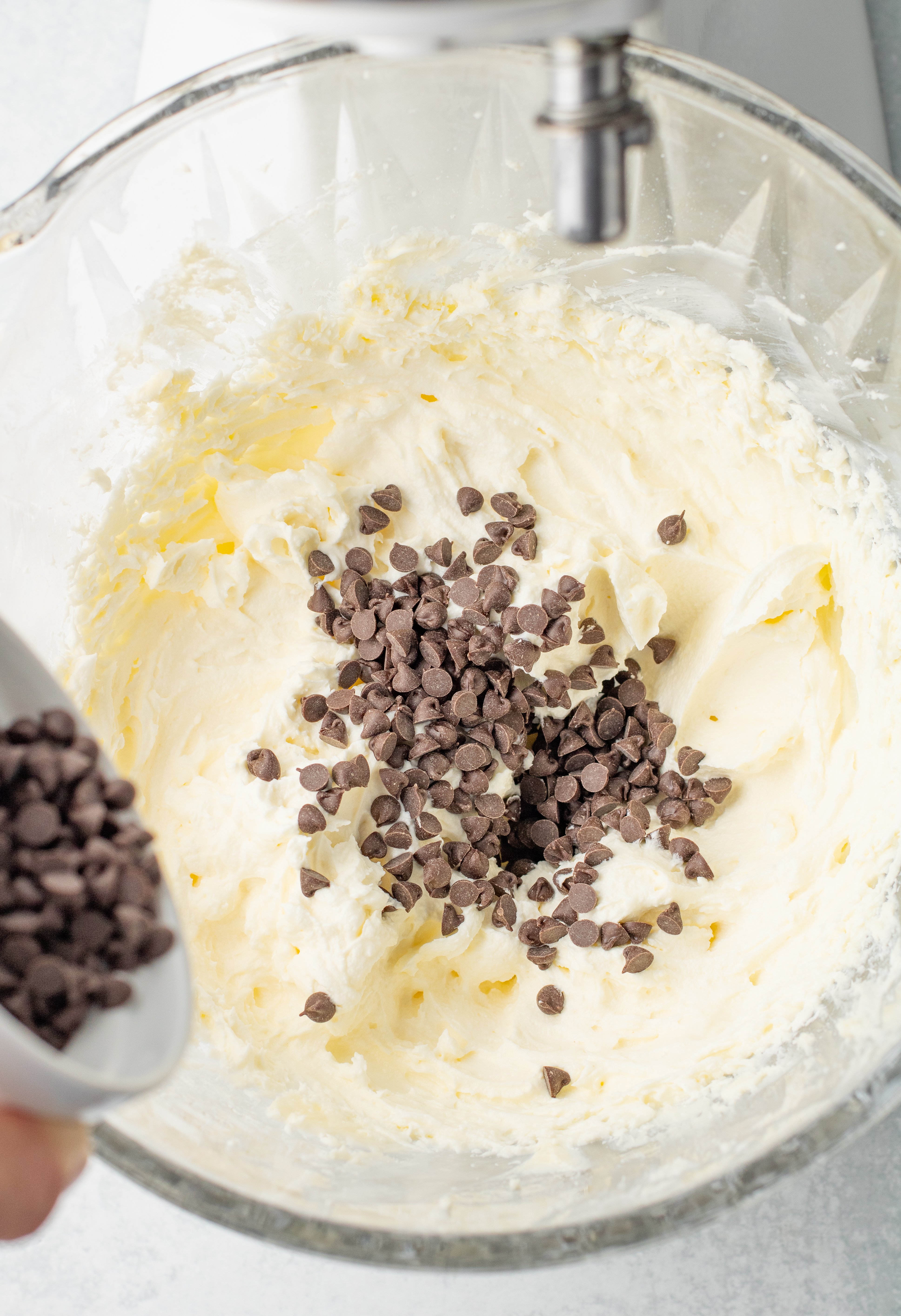 mini chocolate chips poured onto cream cheese mixture
