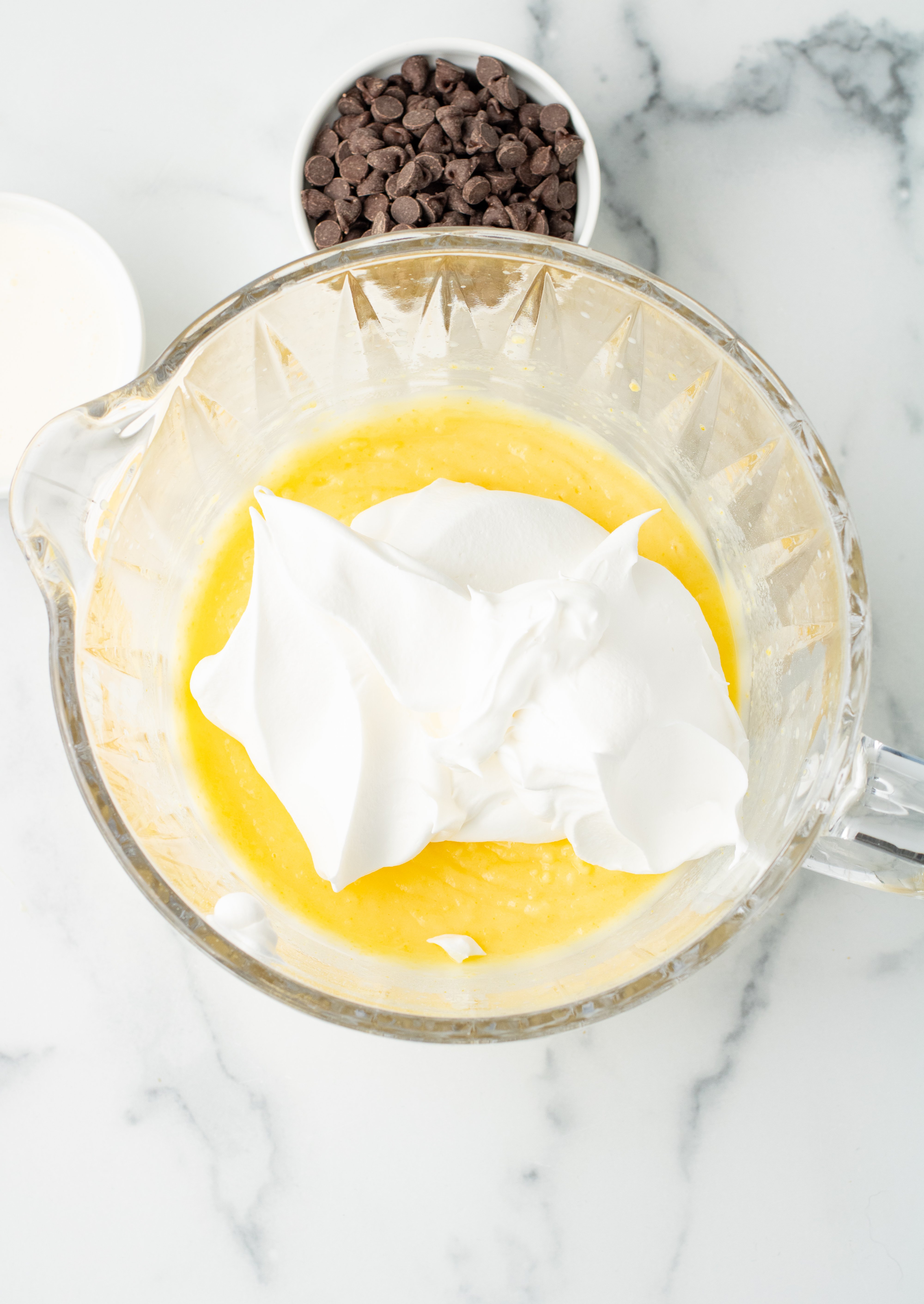 cool whip added to bowl with instant pudding mixture