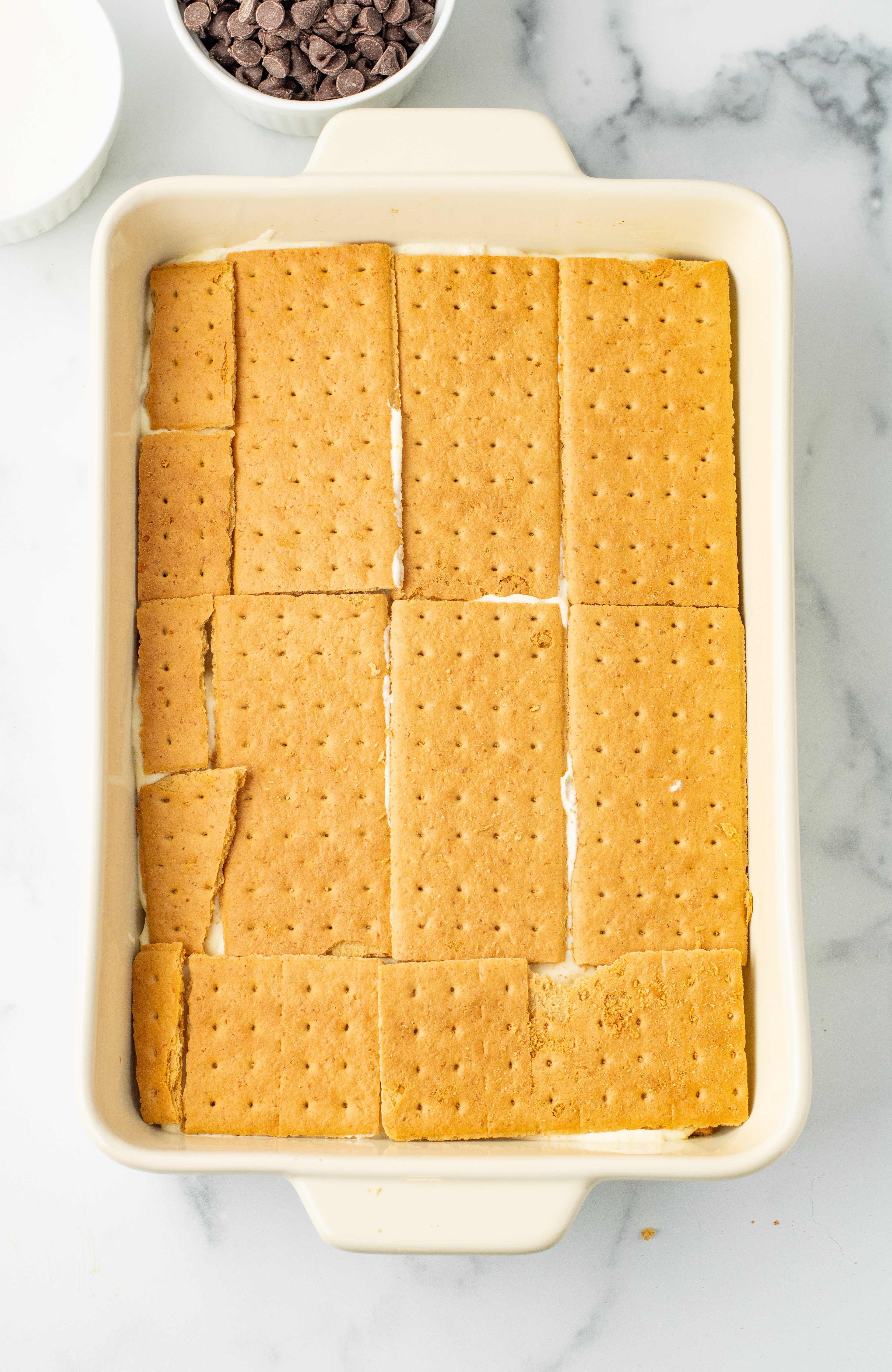 layers of graham crackers and vanilla pudding mix finished with graham crackers on top