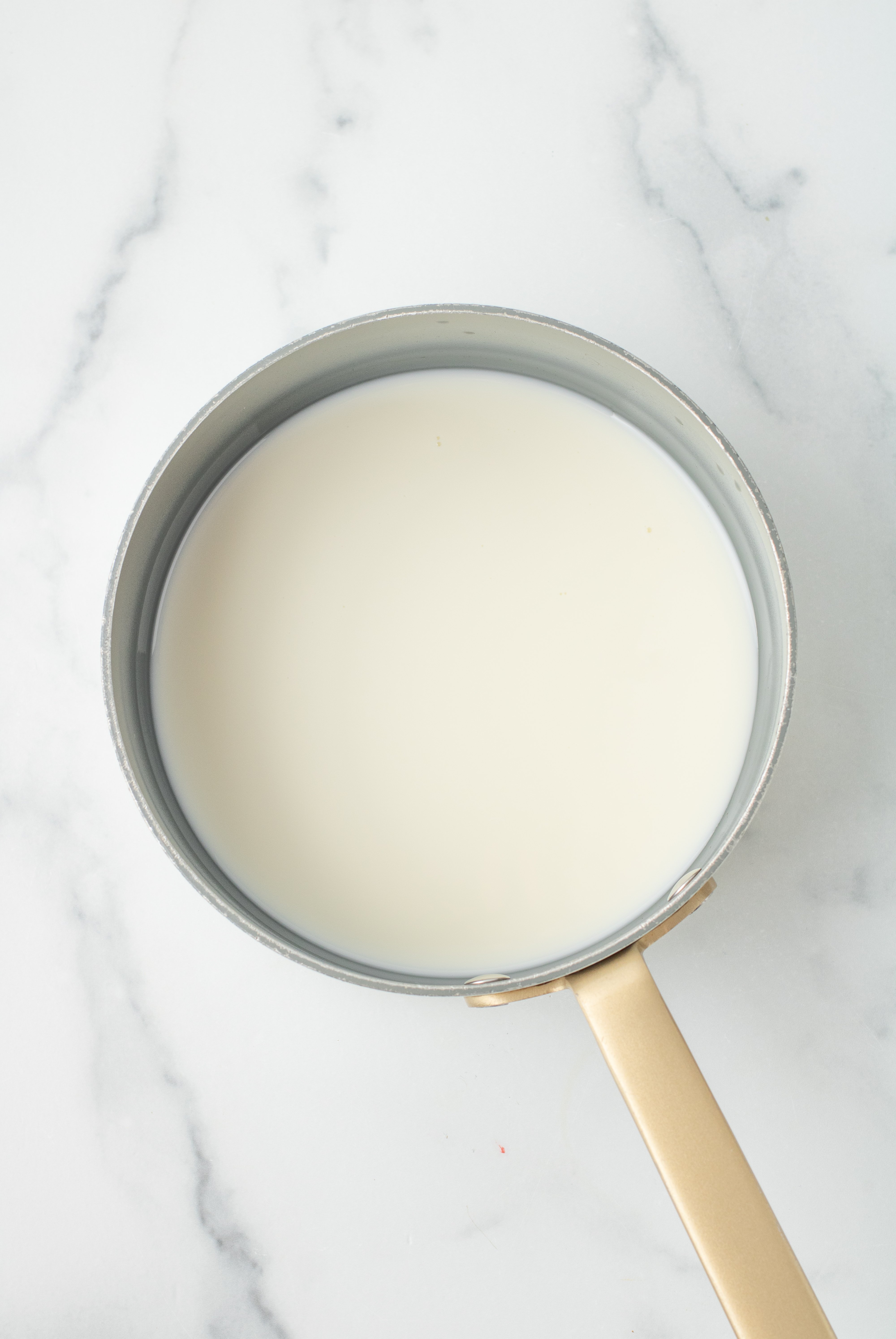 heavy cream in small saucepan