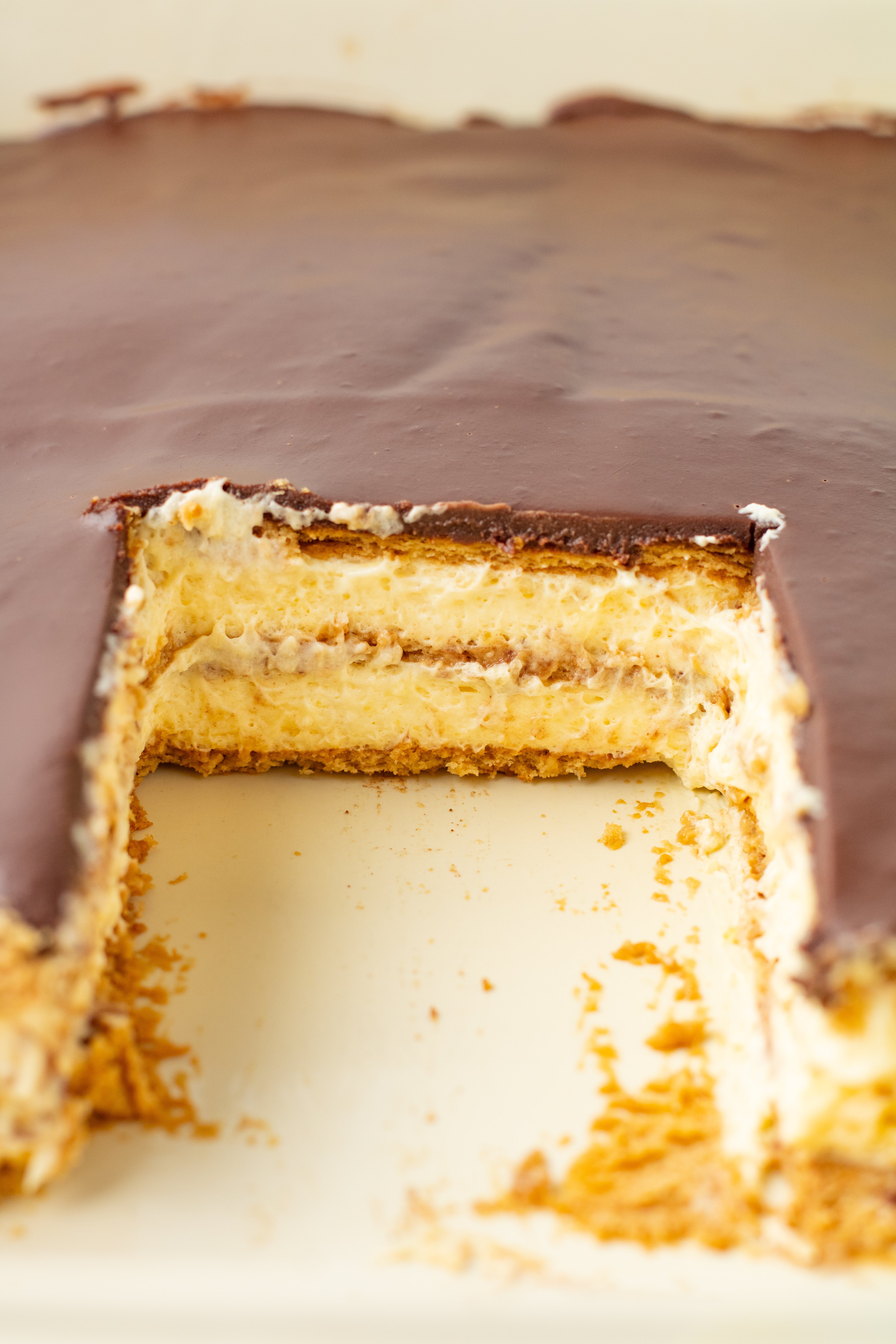 chocolate eclair cake with slices missing from pan