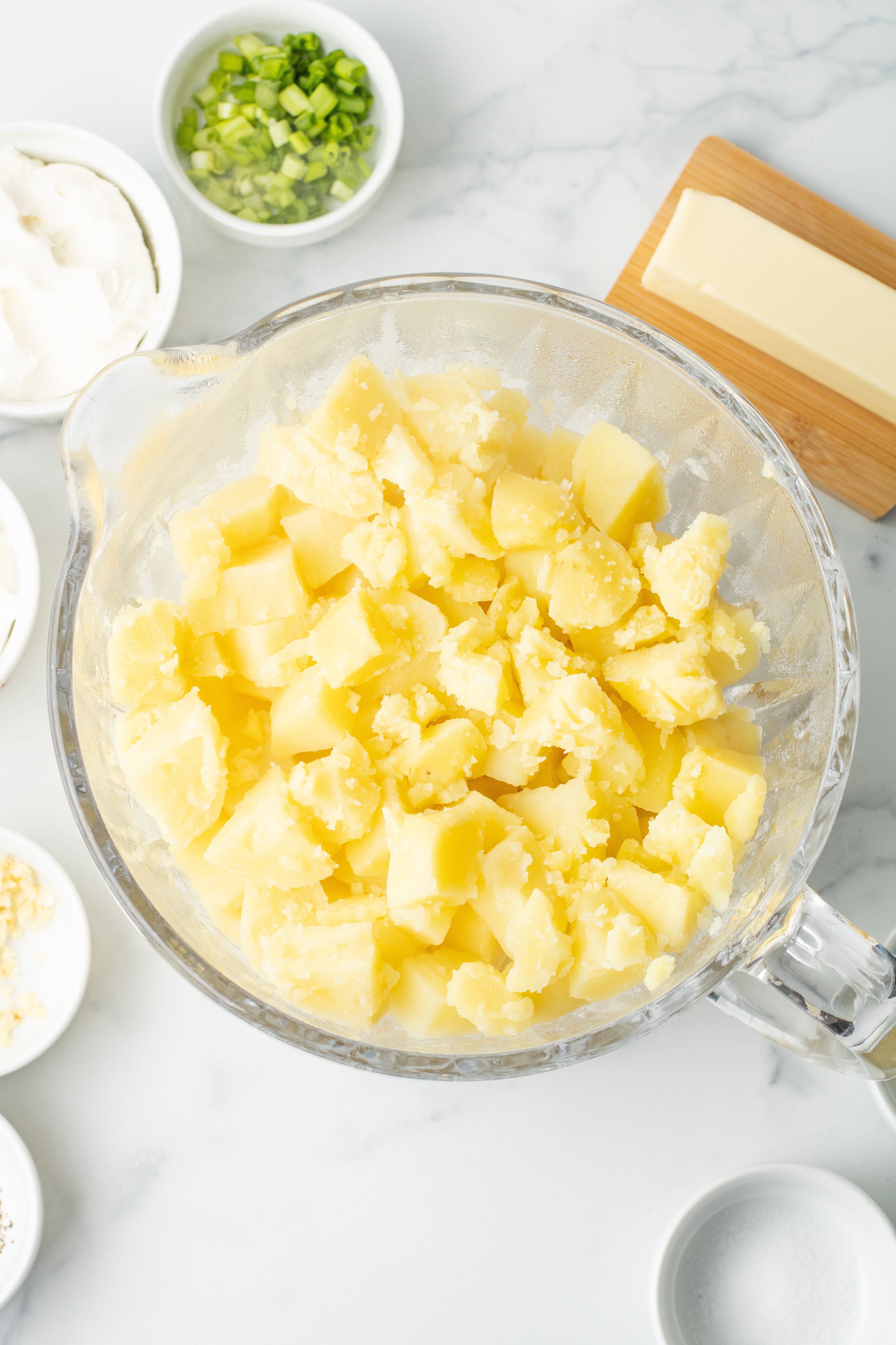 cooked, mashed potatoes in a large bowl