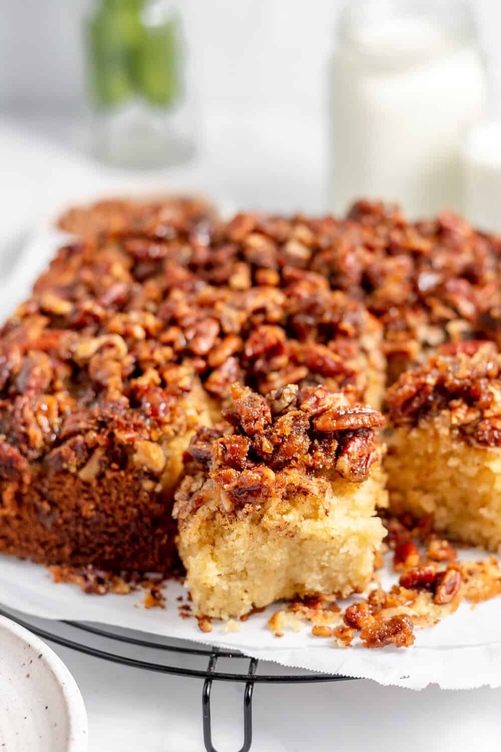 pecan upside down cake with a square cut out