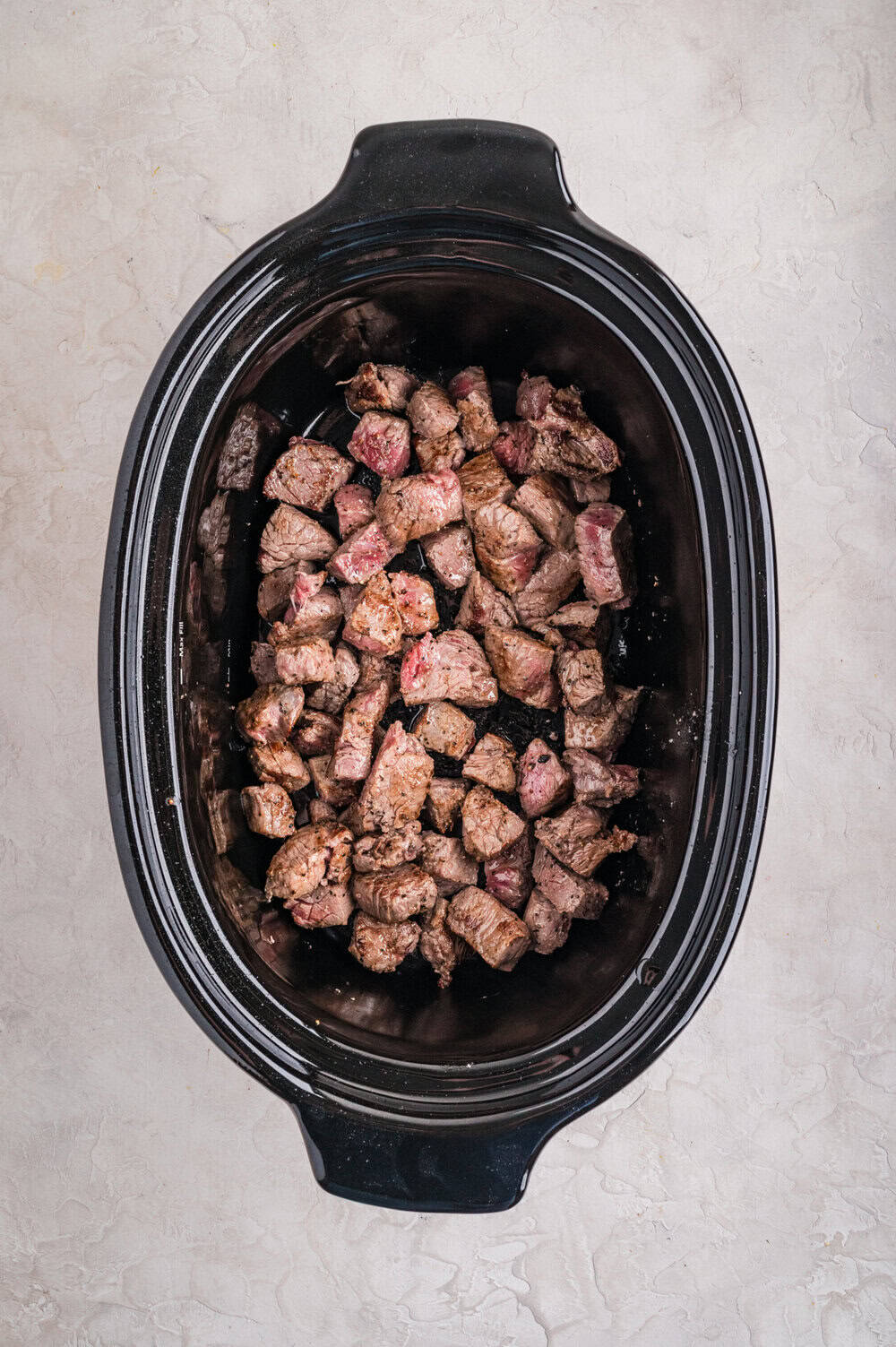 steak bites in slow cooker dish with other ingredients