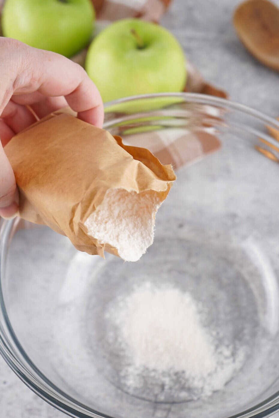 dry pudding mix pouring into bowl