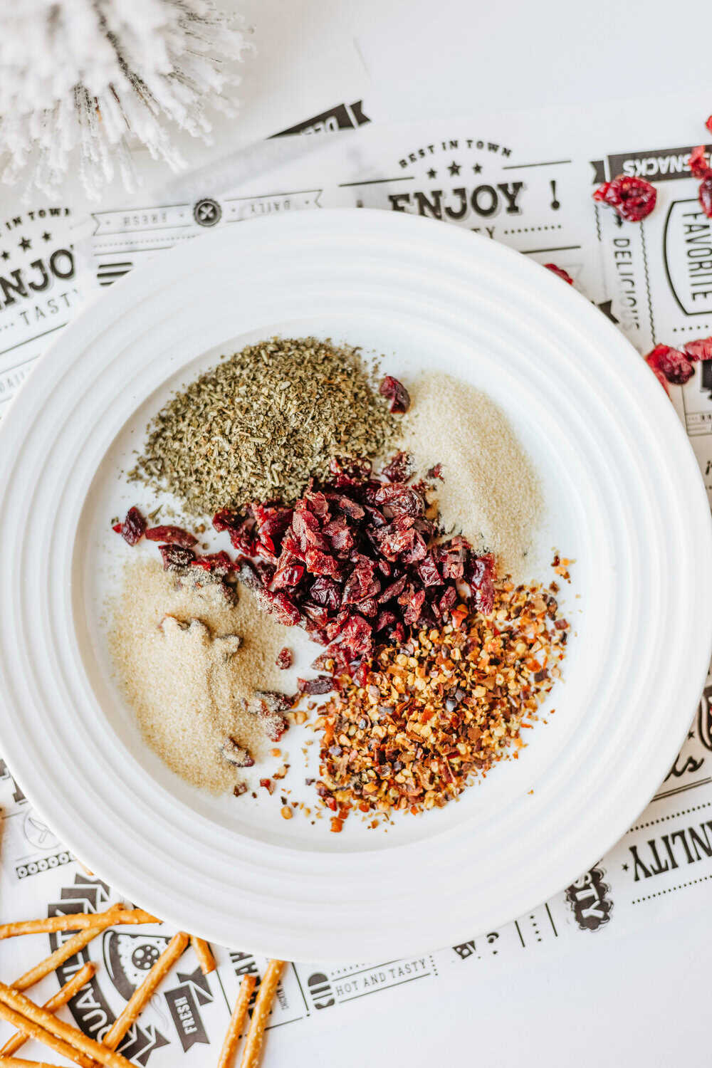spices and toppings for christmas tree cheese on a plate