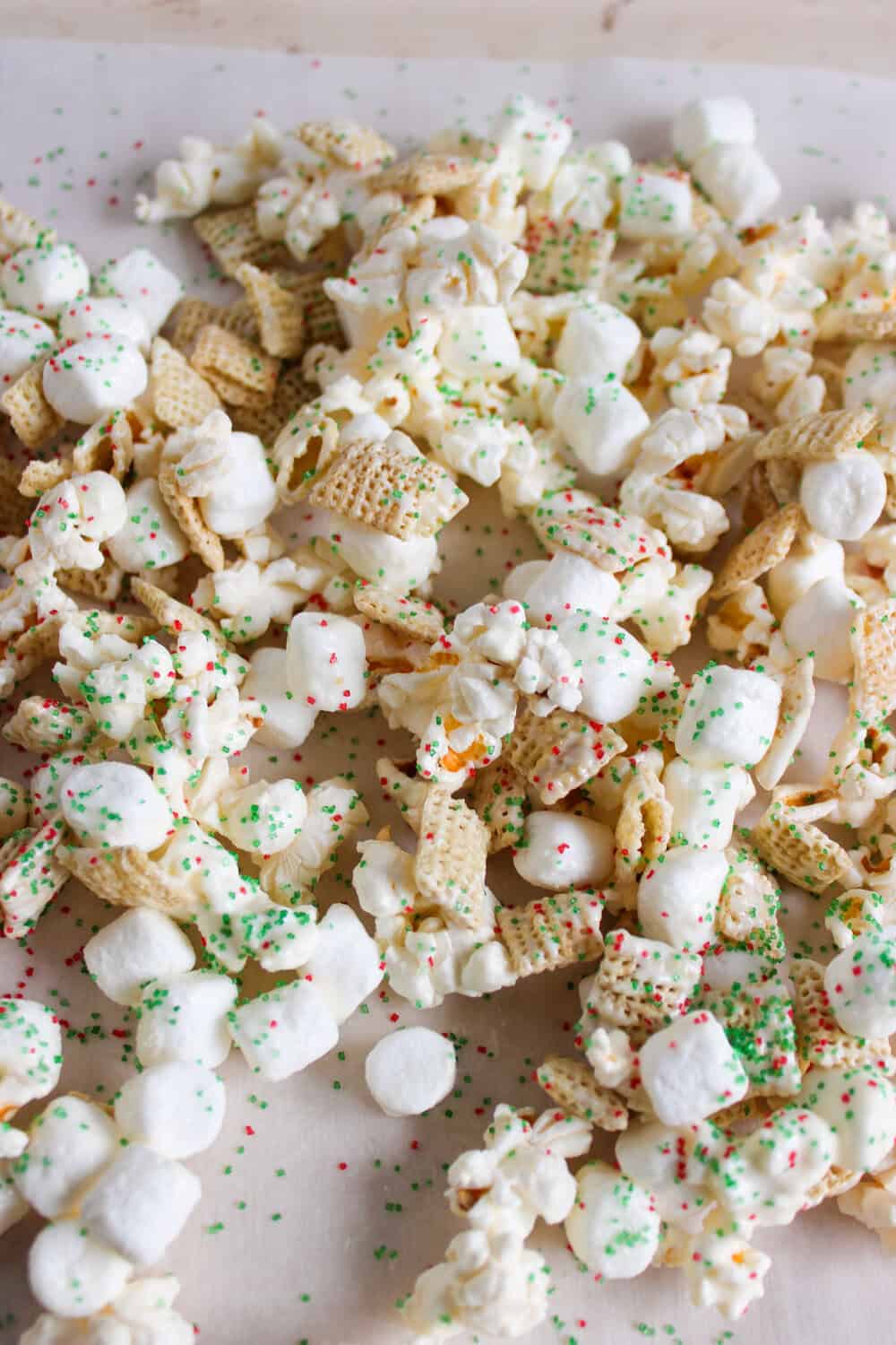 popcorn with white chocolate, marshmallows and Christmas sprinkles