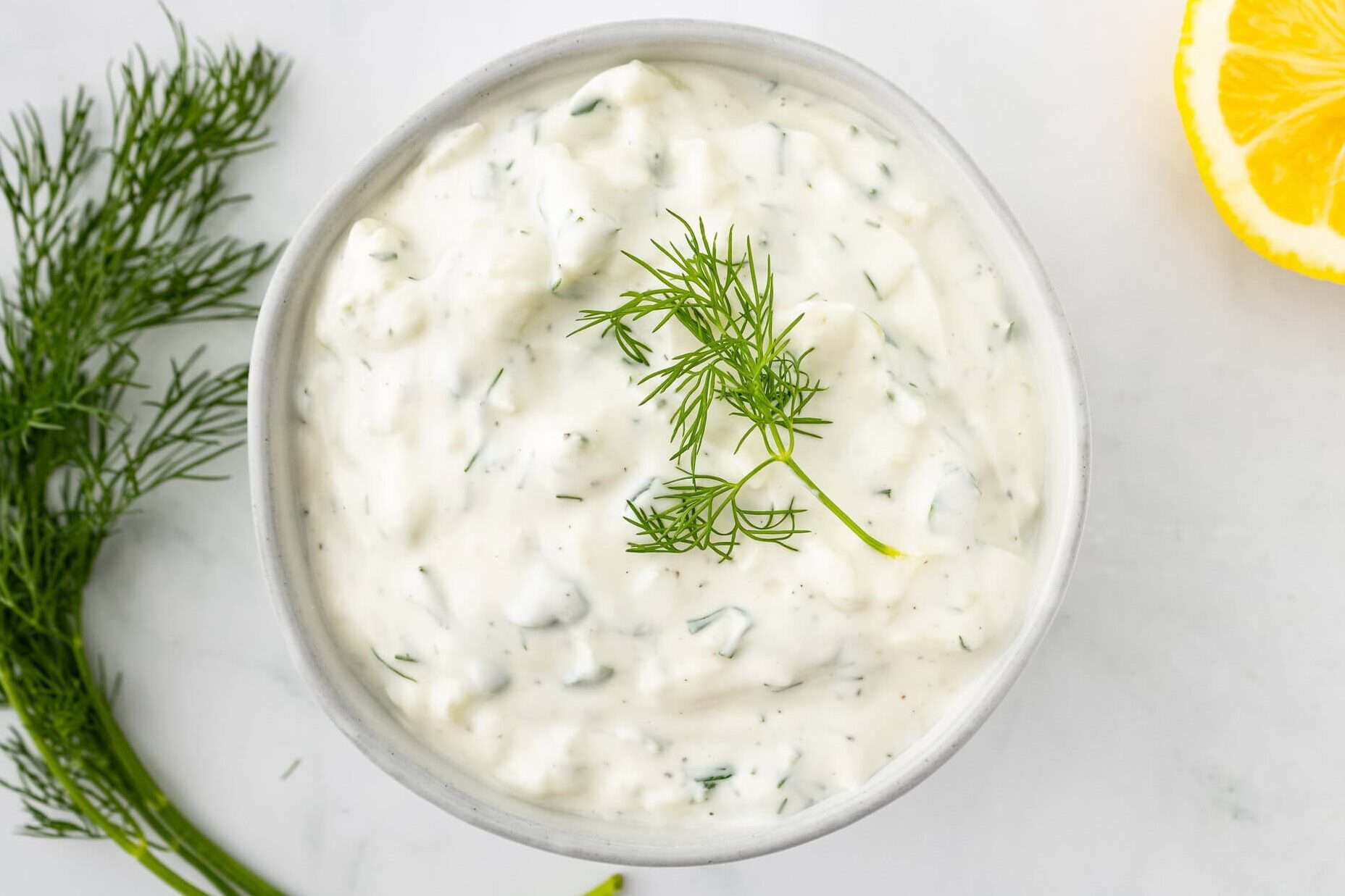 homemade Tzatziki sauce in a white bowl