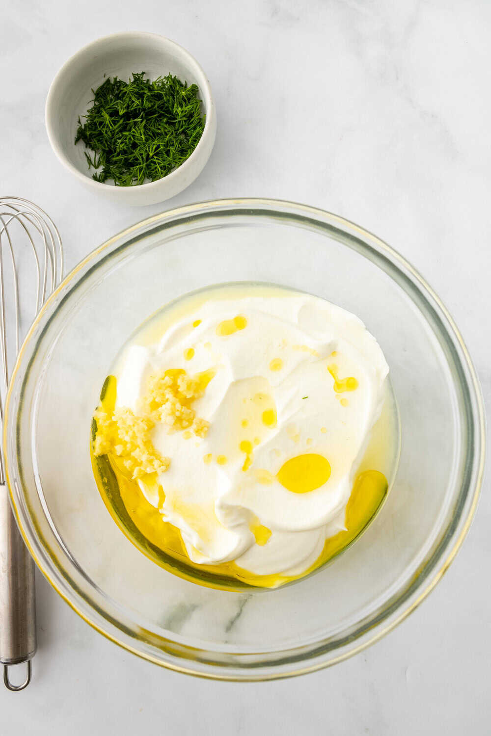 olive oil and lemon juice added to bowl