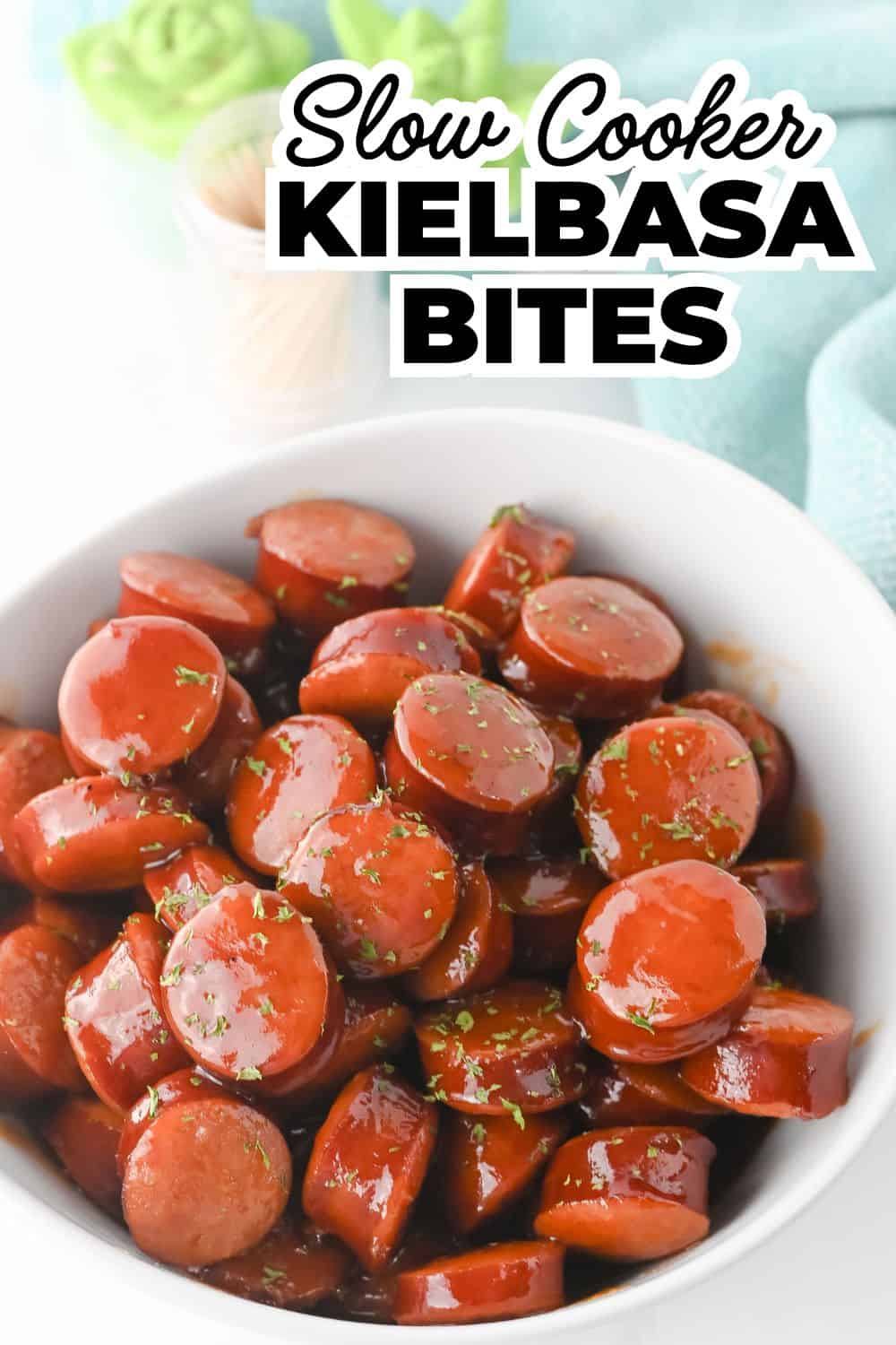 kielbasa bites cooked in slow cooker (crockpot) and served in a white bowl