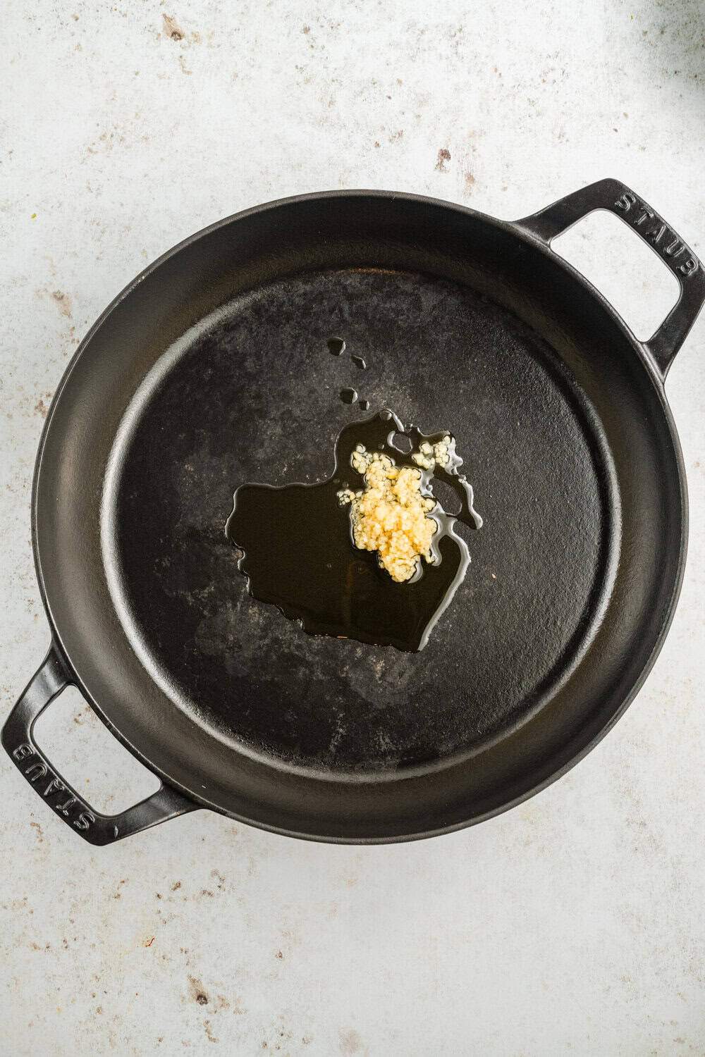 olive oil and minced garlic in a skillet