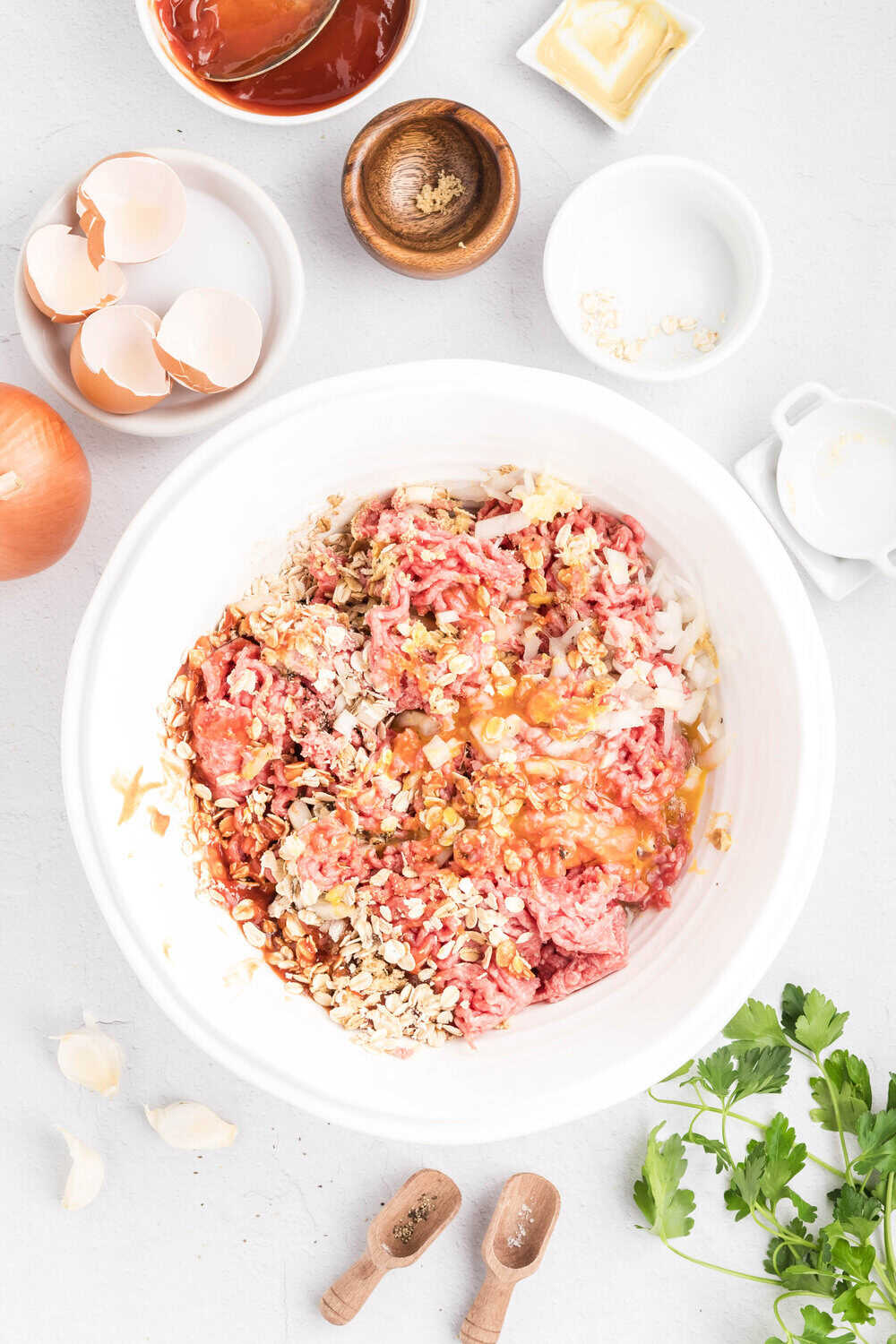 ingredients partially mixed together for oatmeal meatloaf