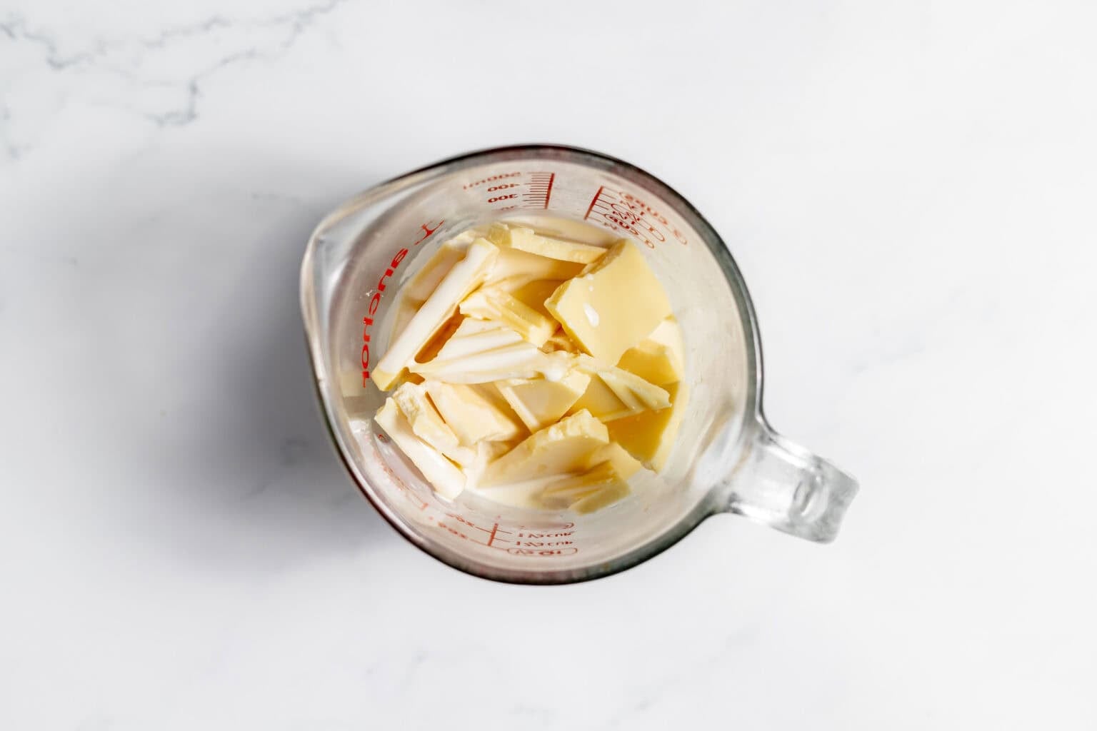 white chocolate in mixing bowl