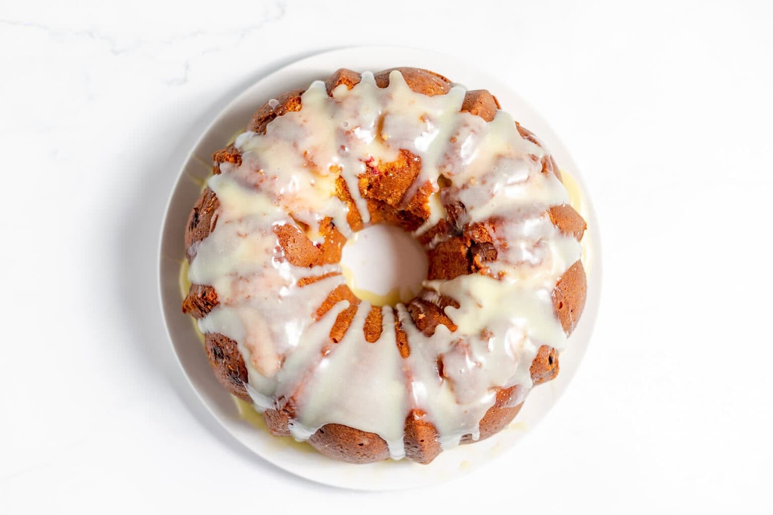 cake covered in white chocolate ganache glaze