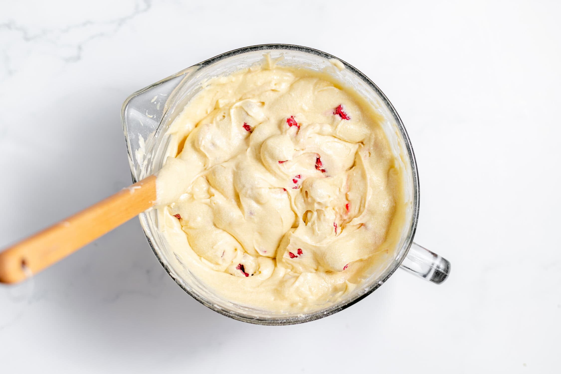 raspberries stirred into batter