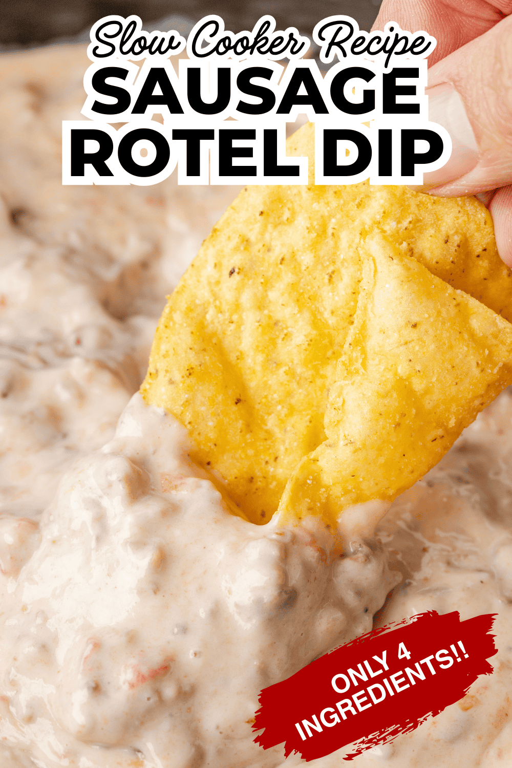 sausage rotel dip with a chip dipping in it