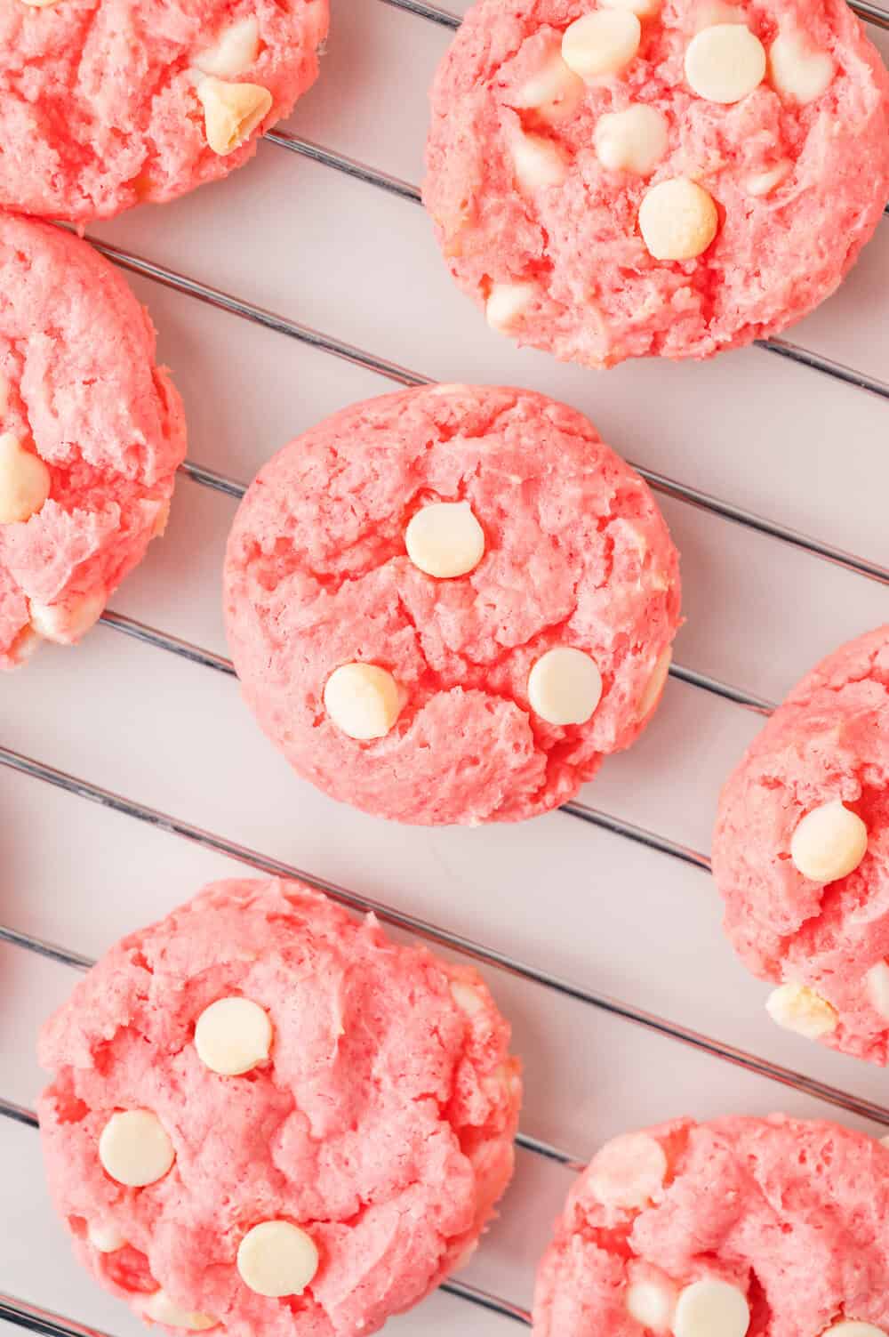 strawberry cookies on a wire rack