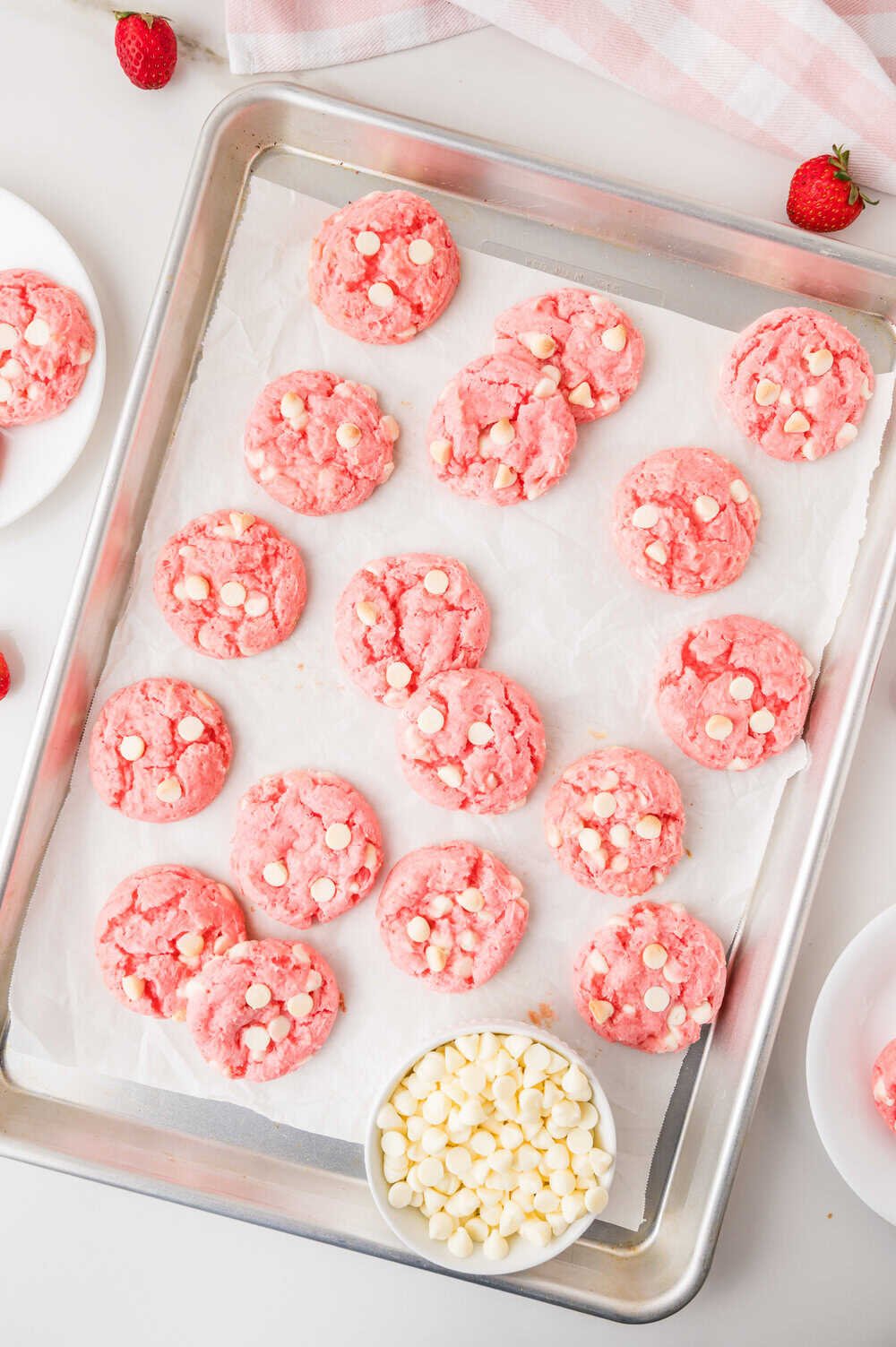 strawberry cake mix cookies on a baking sheet