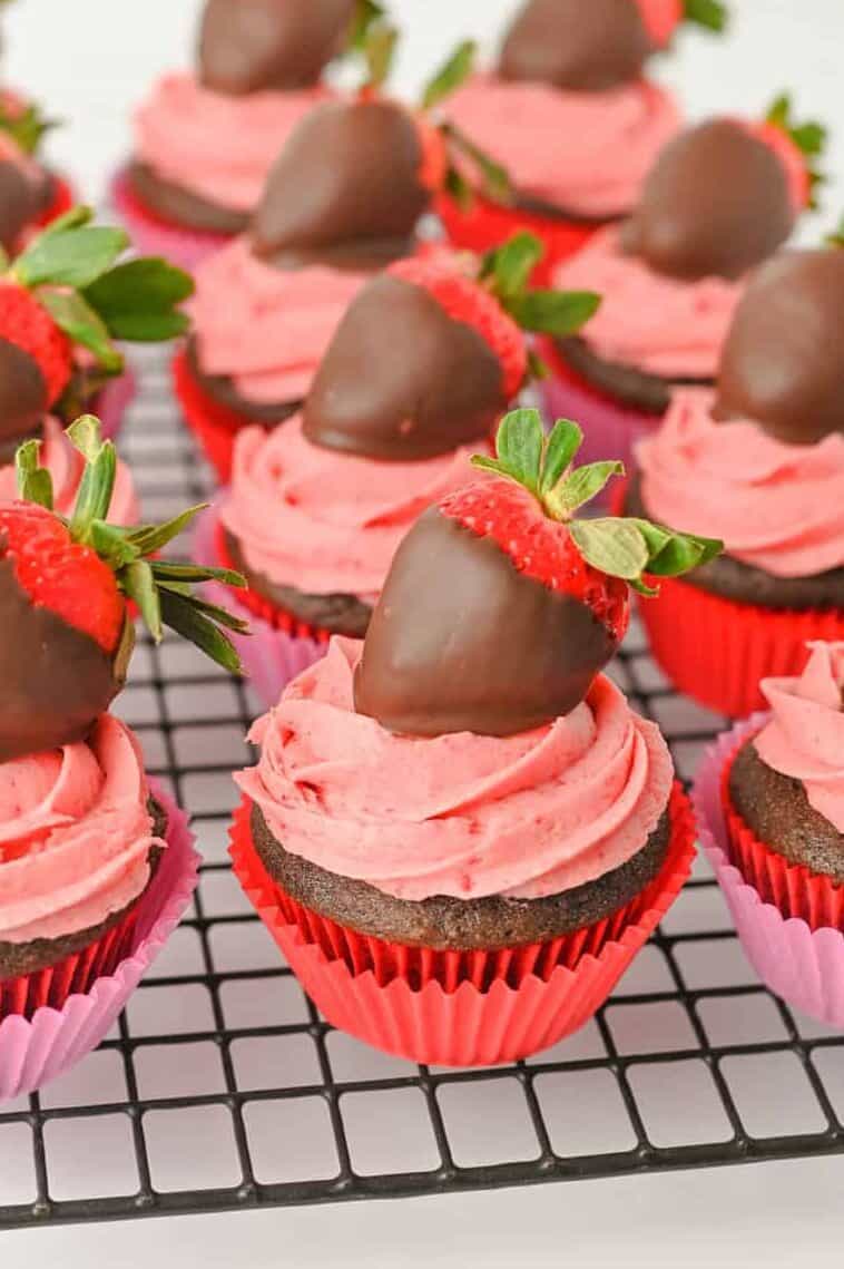 Chocolate Covered Strawberry cupcakes on a wire rack