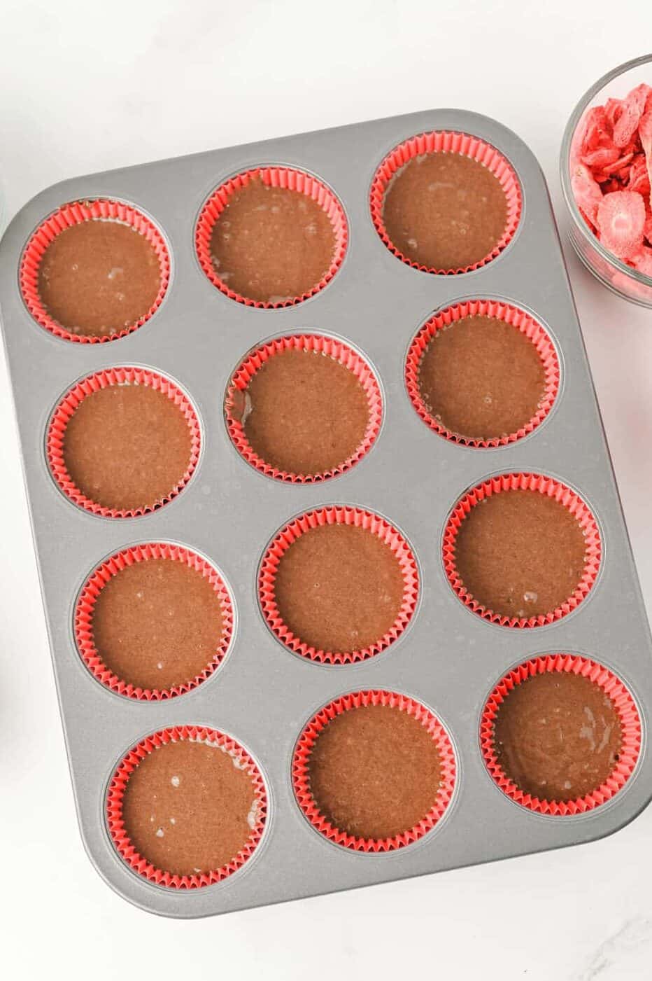 chocolate cake batter in cupcake pan