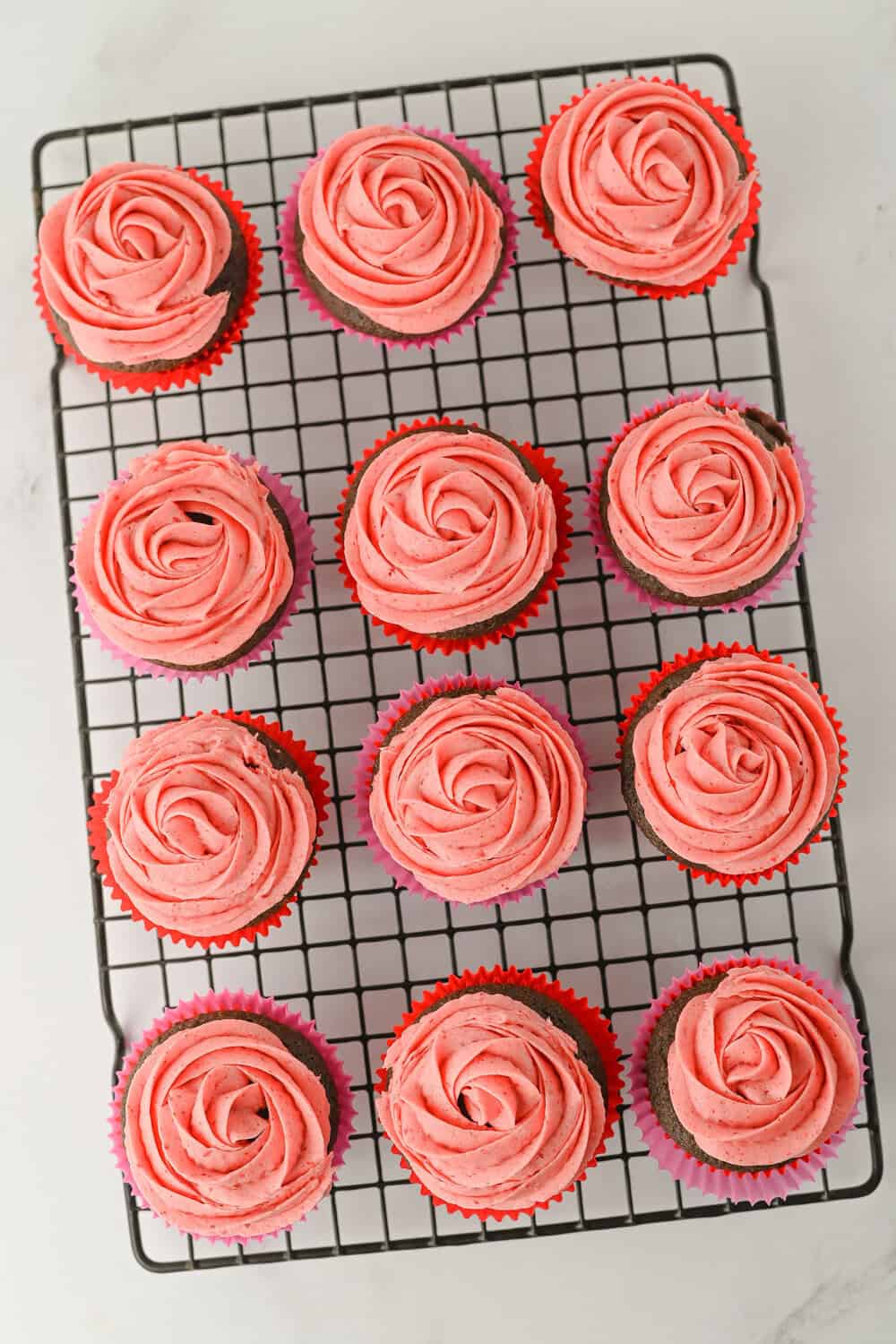 chocolate cupcakes with strawberry frosting