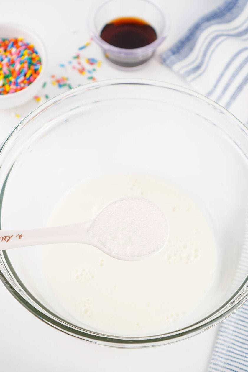 adding sugar and salt