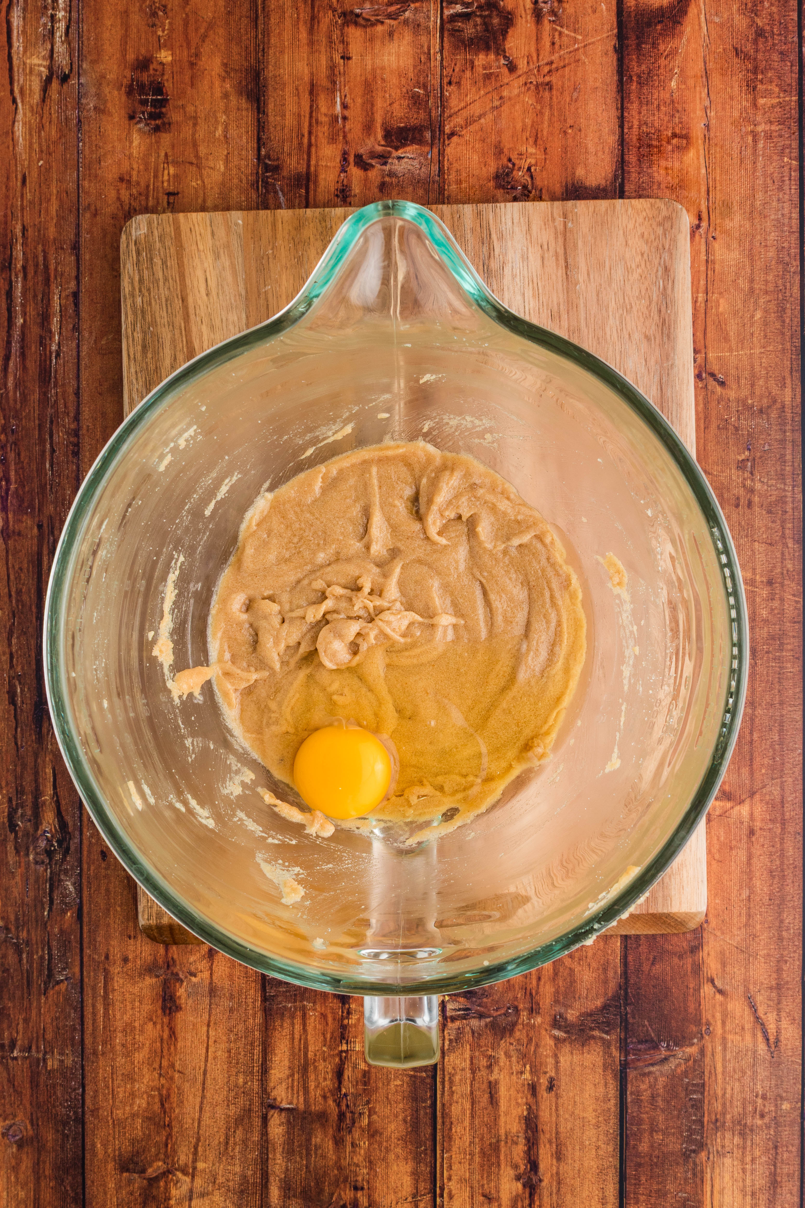 eggs being added to sugar/butter mixture