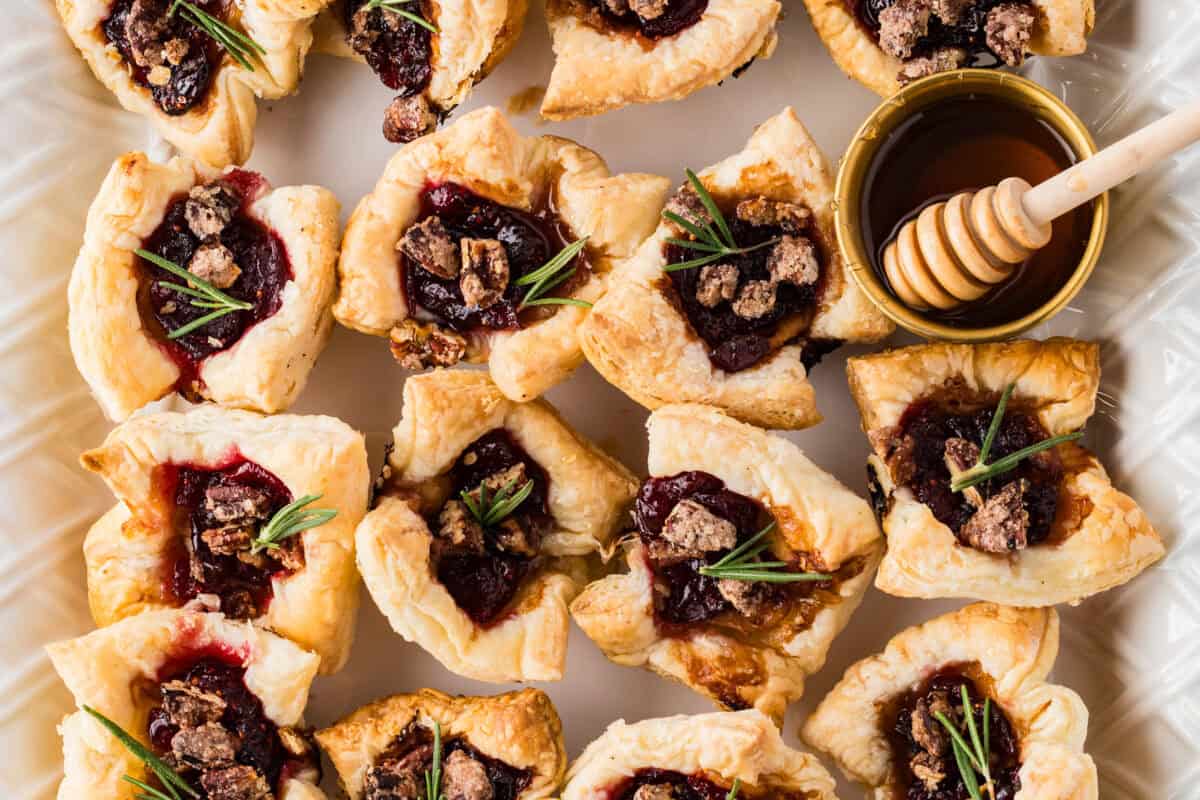 Baked Brie Bites with cranberry sauce and honey