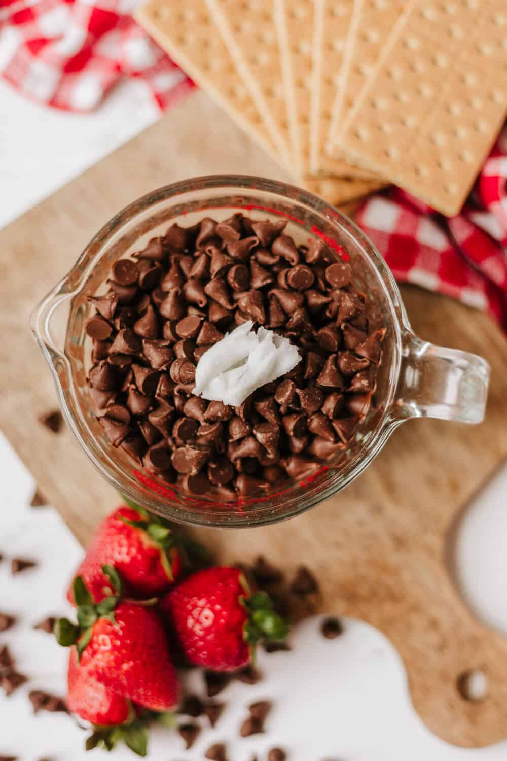 chocolate chips in a dish with coconut oil