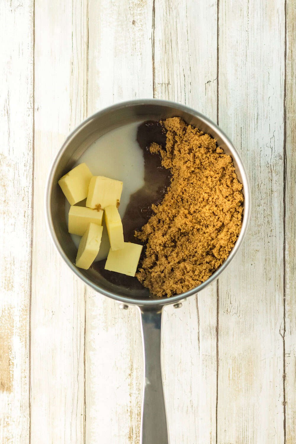  butter and brown sugar in milk in a saucepan