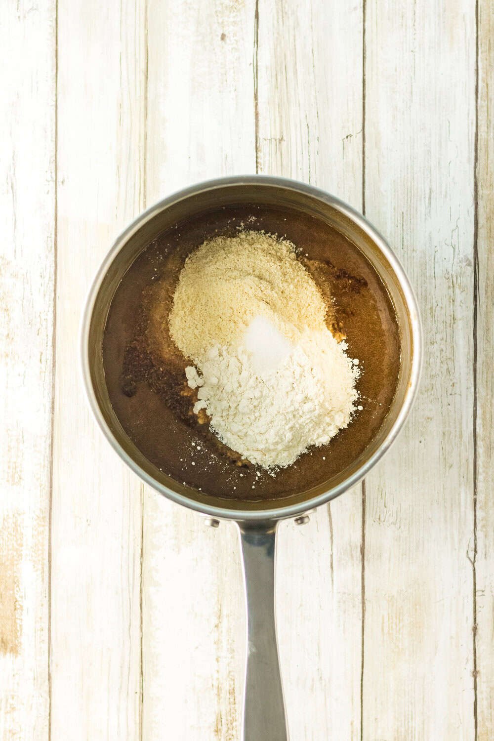 dry ingredients added to melted wet ingredients for lace cookies