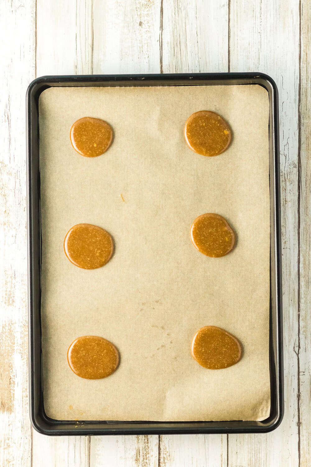 lace cookie batter on a cookie sheet