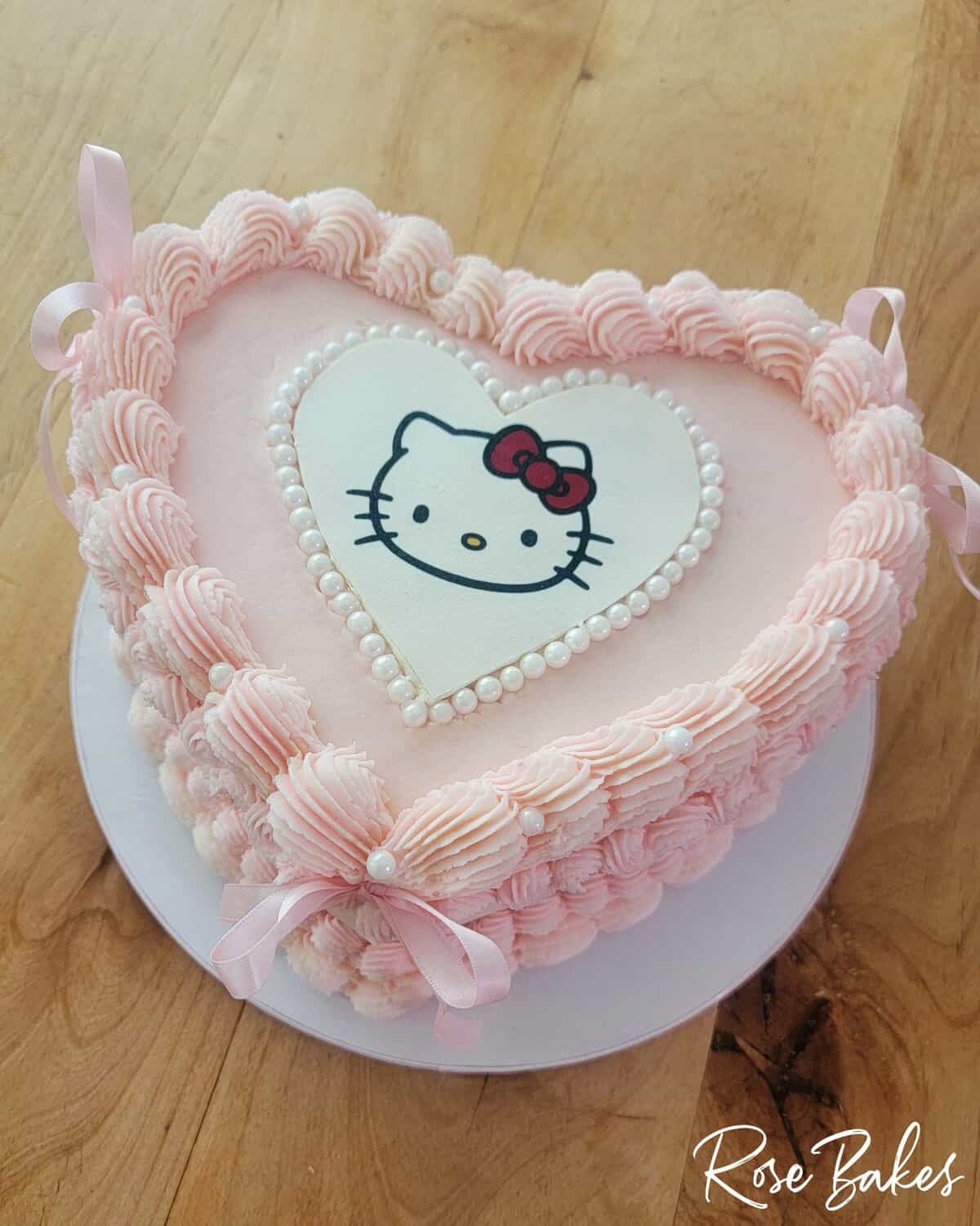 pink vintage heart cake with hello kitty