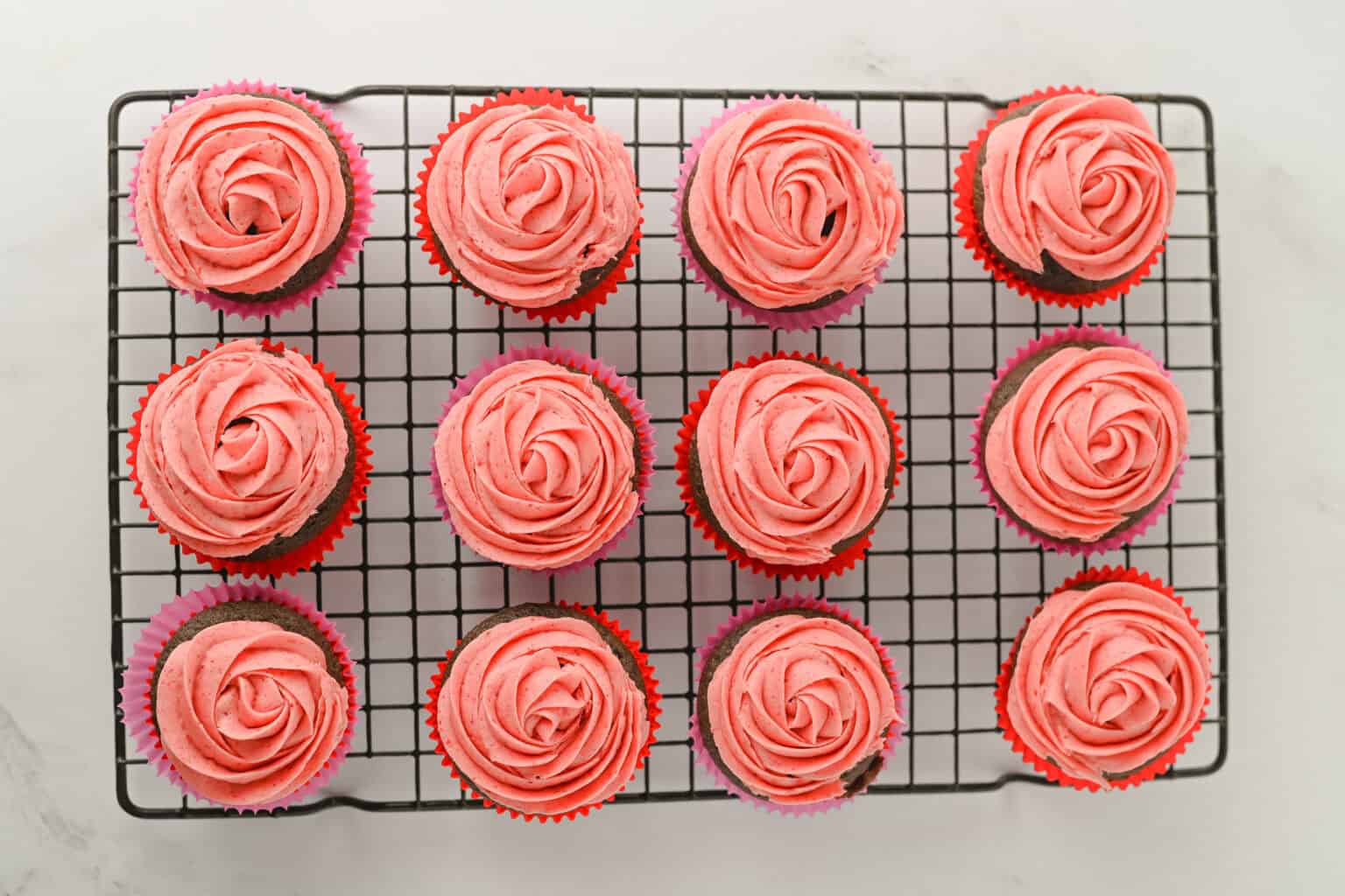 chocolate cupcakes with strawberry frosting