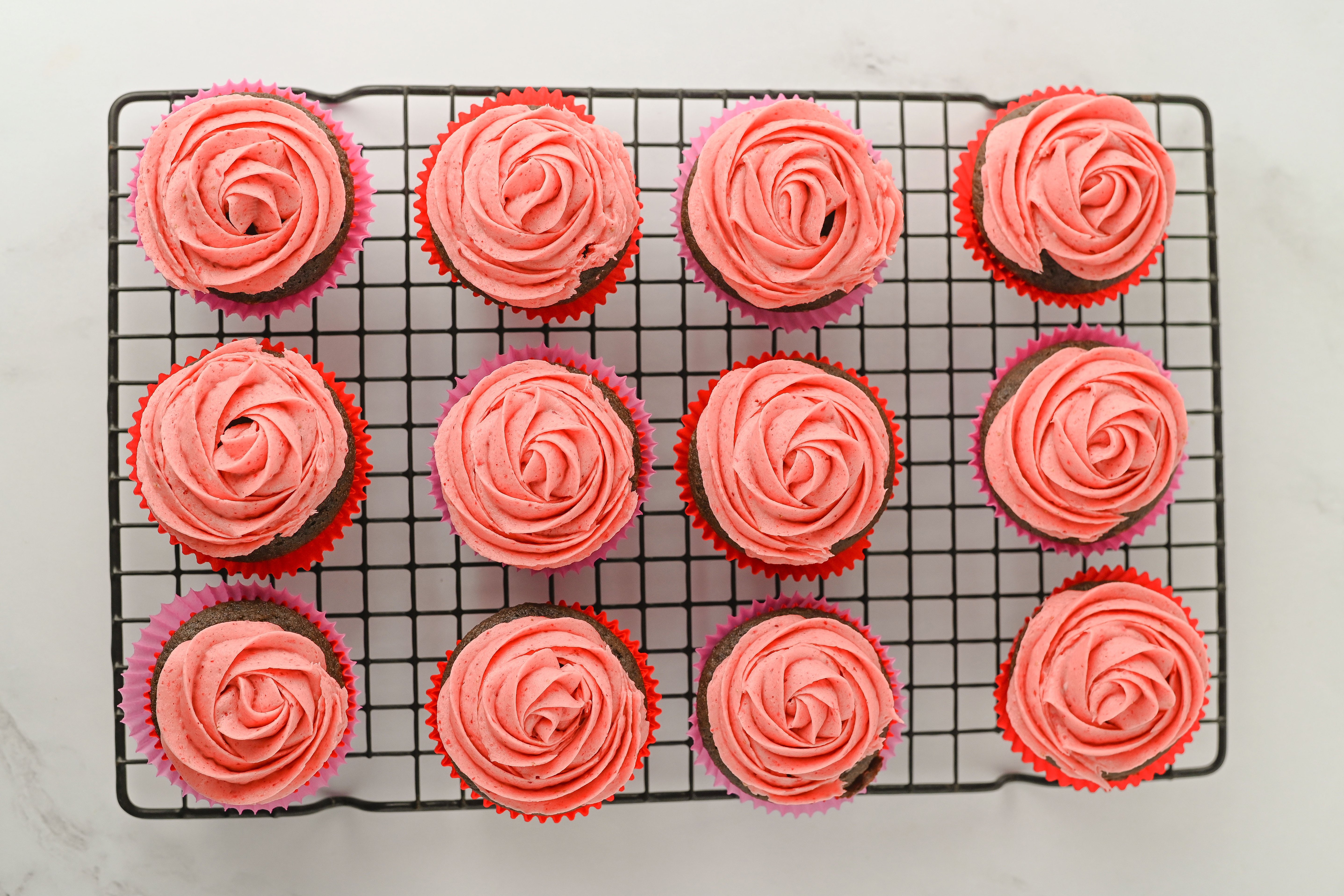 chocolate cupcakes with strawberry frosting