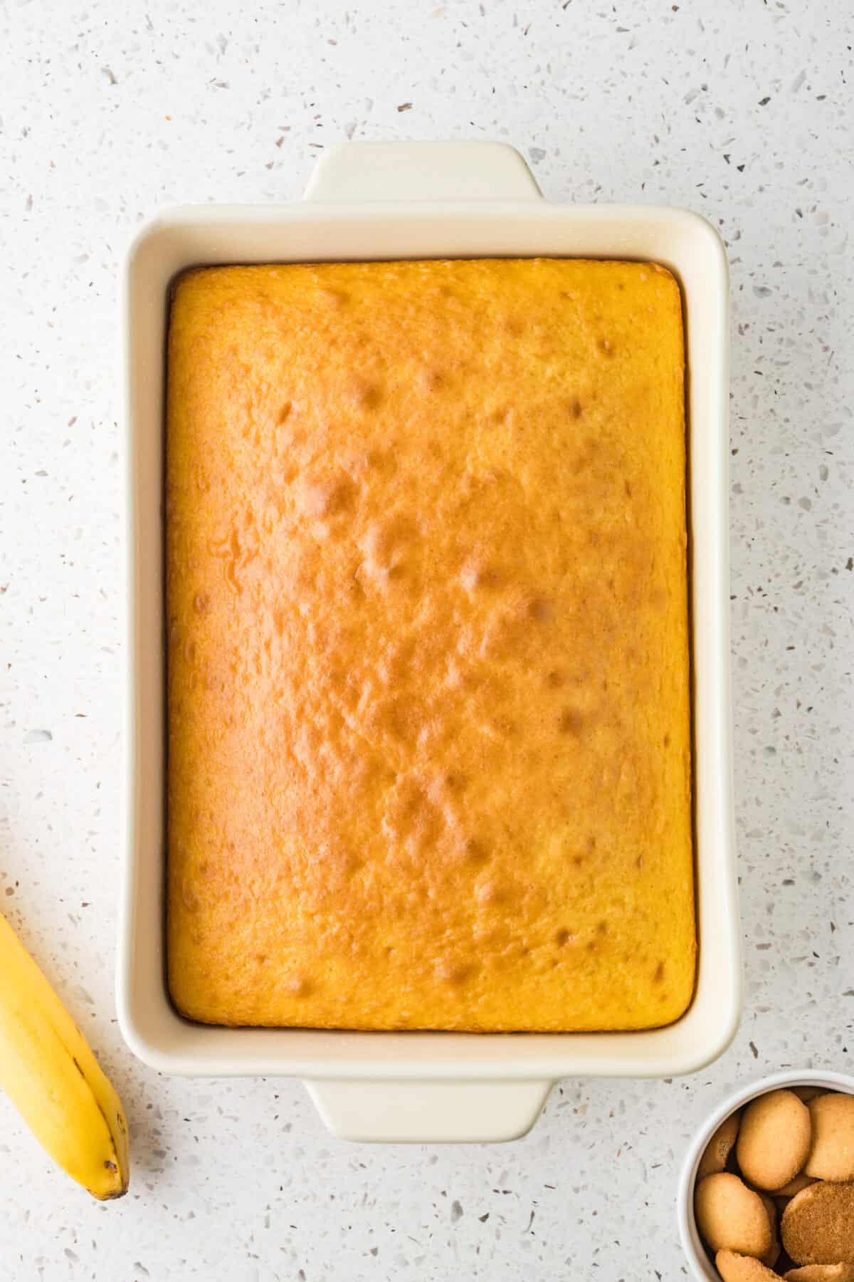 baked yellow cake in a 9x13 dish