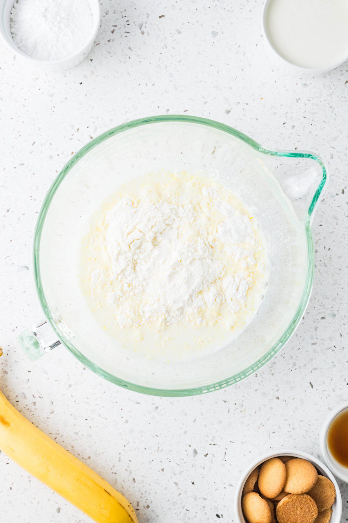 instant pudding mix and milk in a mixing bowl