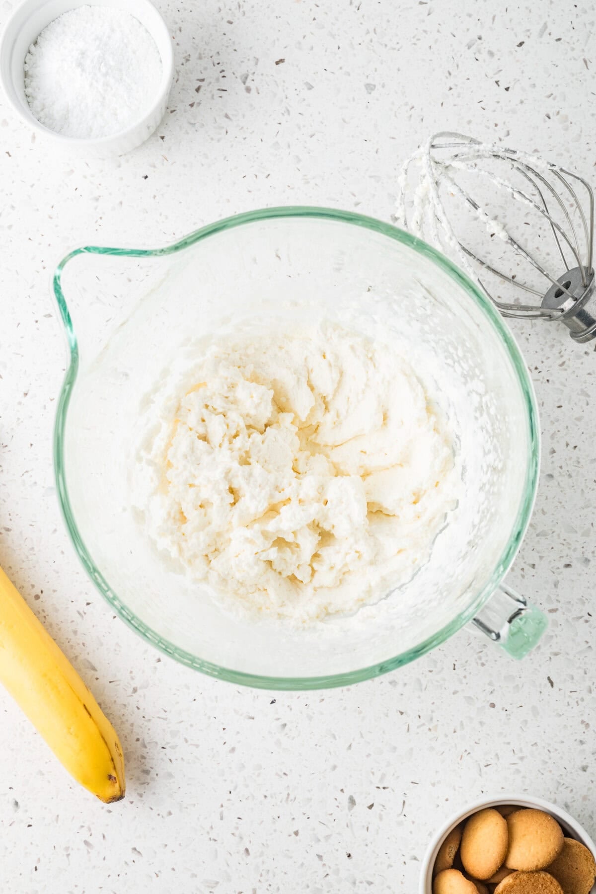 fresh whipped cream in a mixing bowl