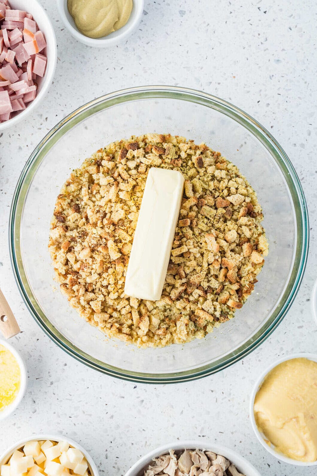 butter in bowl with cornbread dressing mix