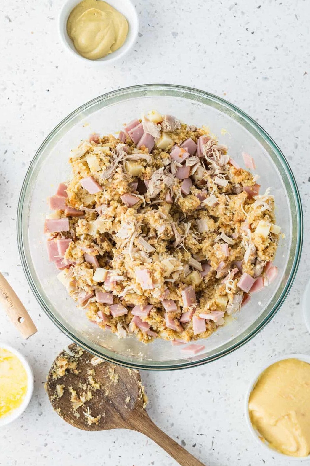 mixed up chicken cordon bleu casserole in a mixing bowl
