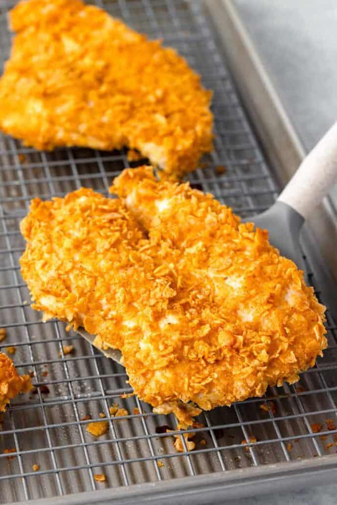 cornflake baked chicken on a wire rack