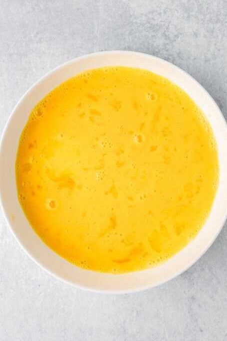 whisked eggs in a bowl