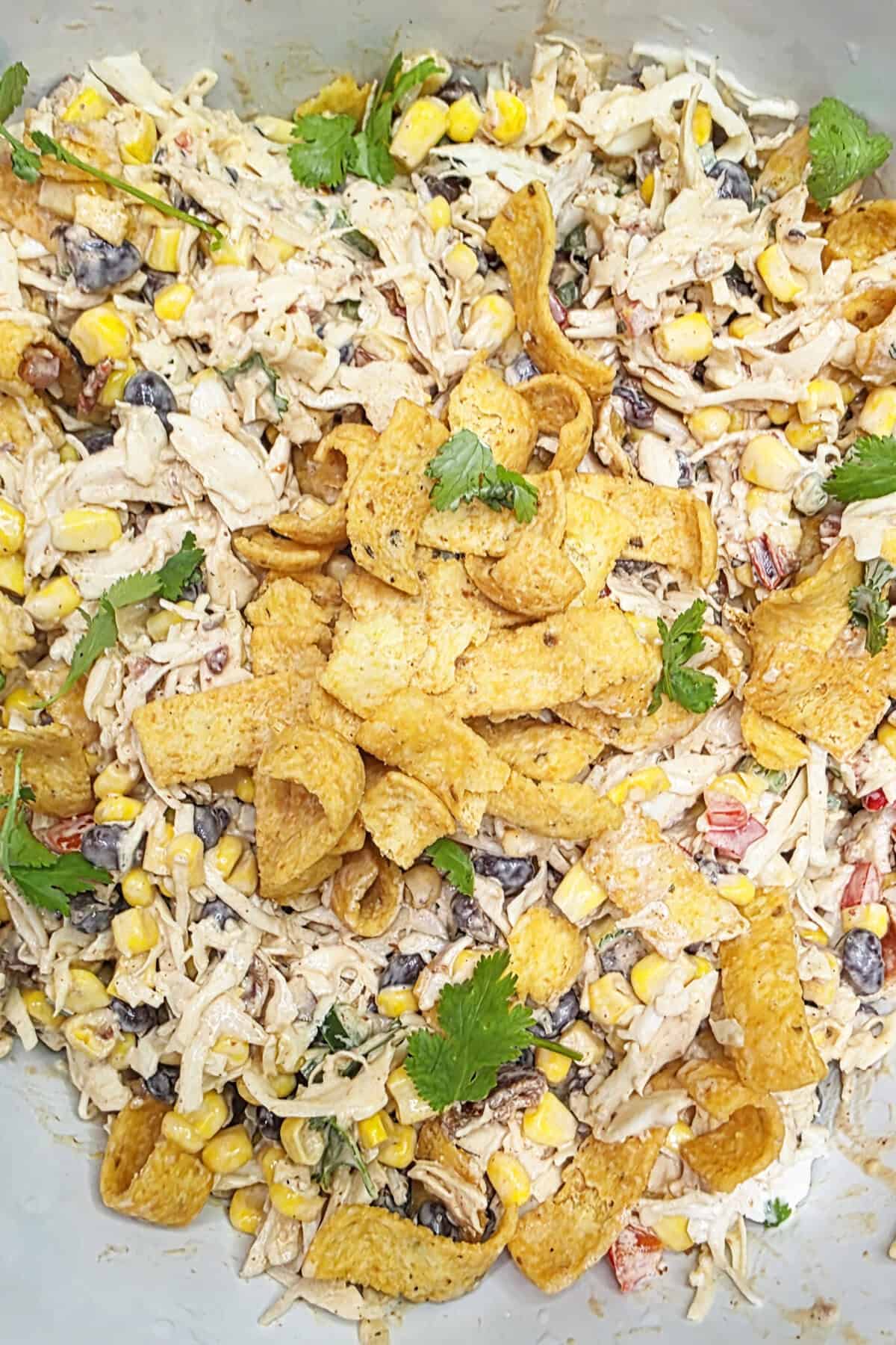 fritos and fresh cilantro over cowboy coleslaw