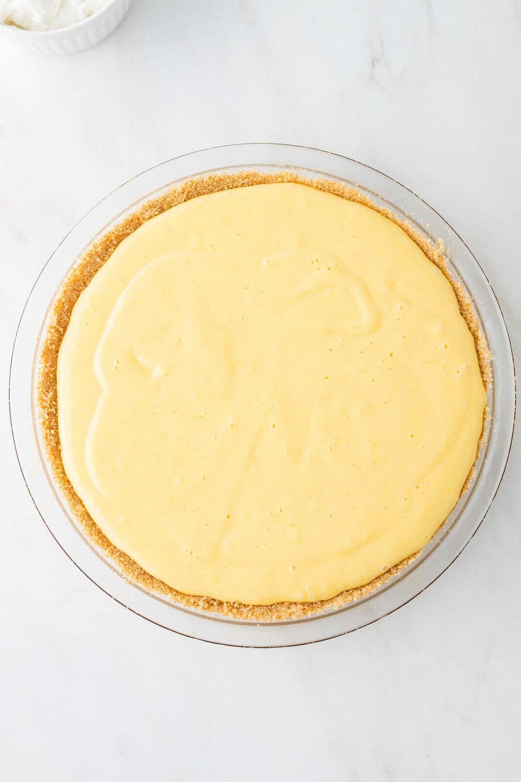 key lime pie filling poured in crust