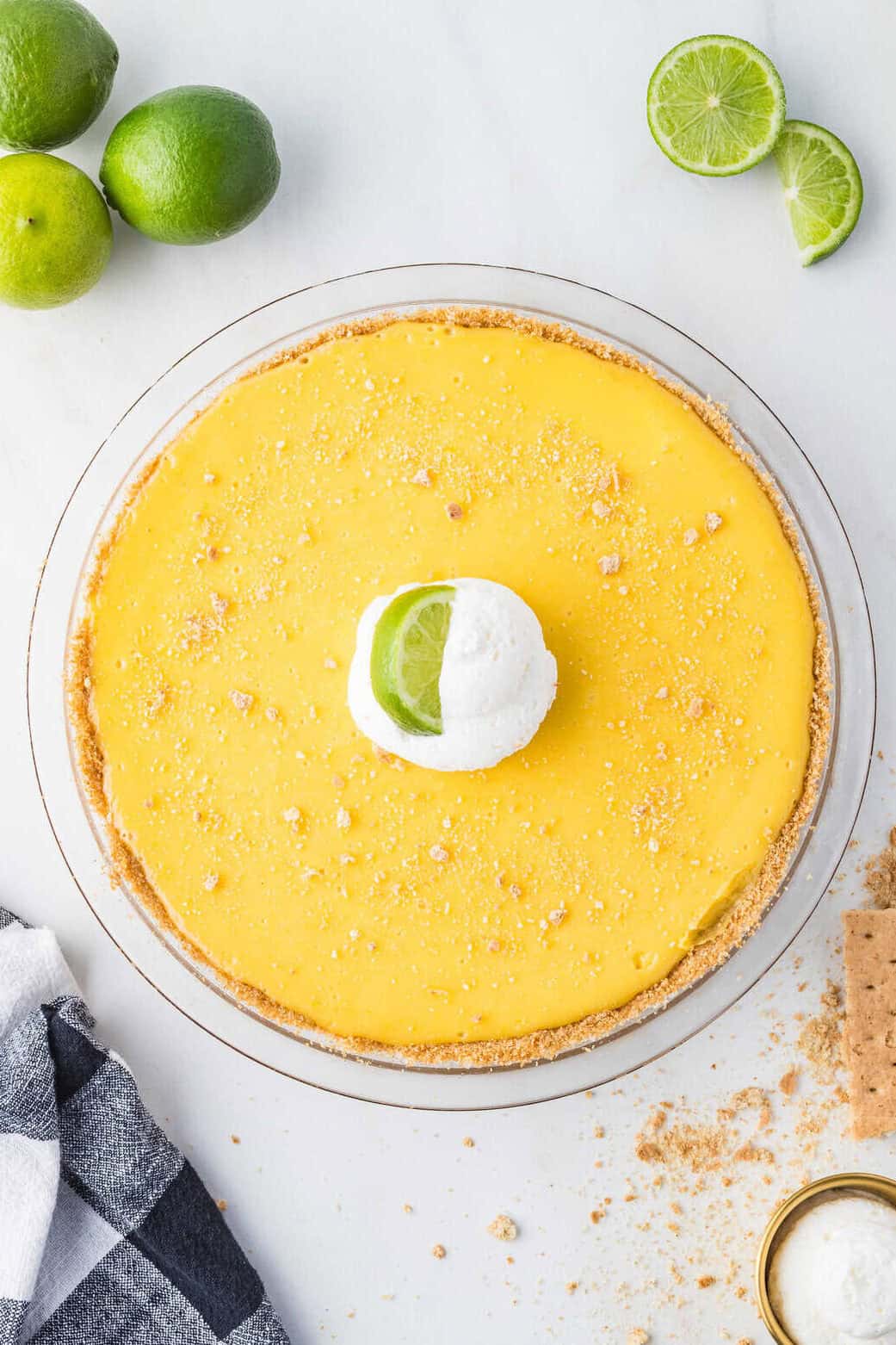 key lime pie garnished with whipped cream