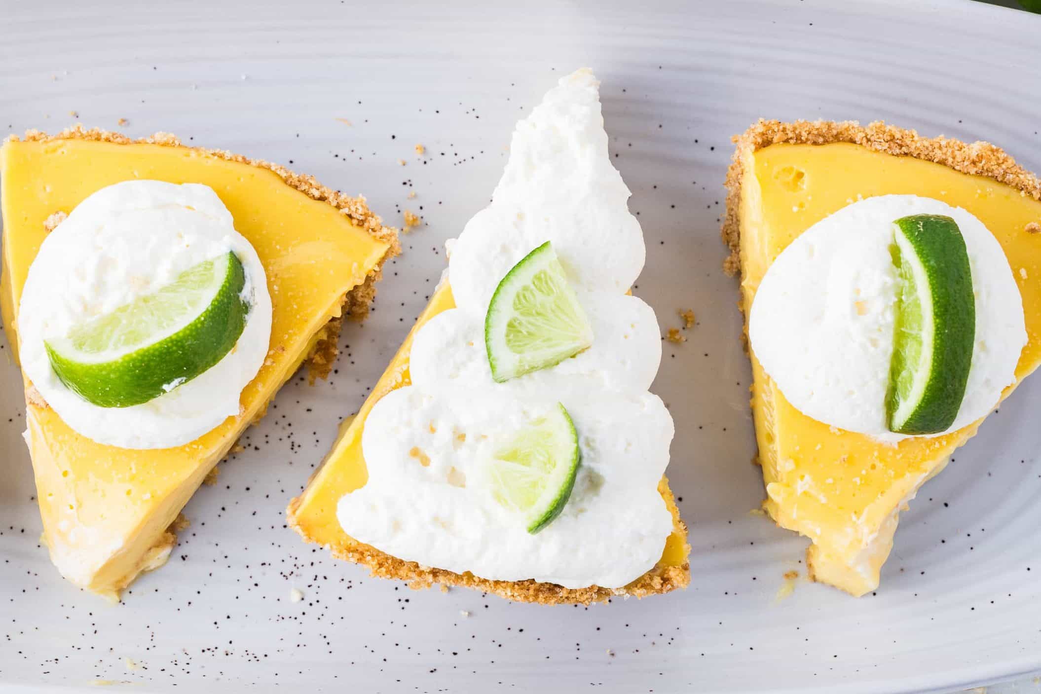 slices of key lime pie with fresh whipped cream